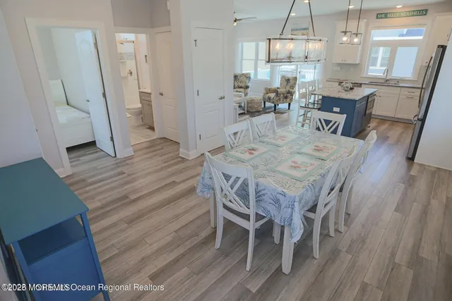 a living room with furniture rug and window