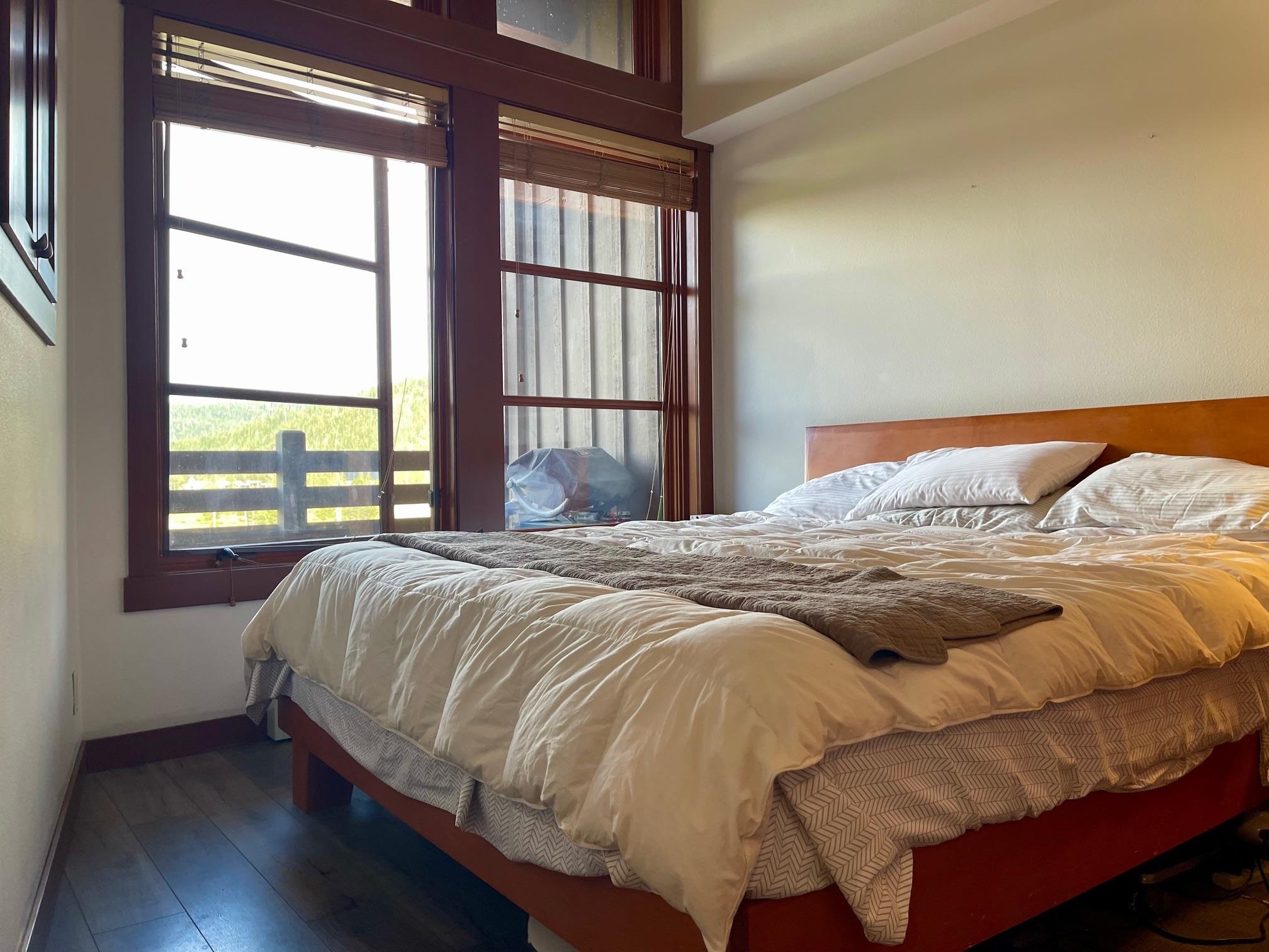 1750 Village East Road, Unit 5417 Olympic Valley, CA 96146 - Photo 11 of 18 a bedroom with a bed and a window