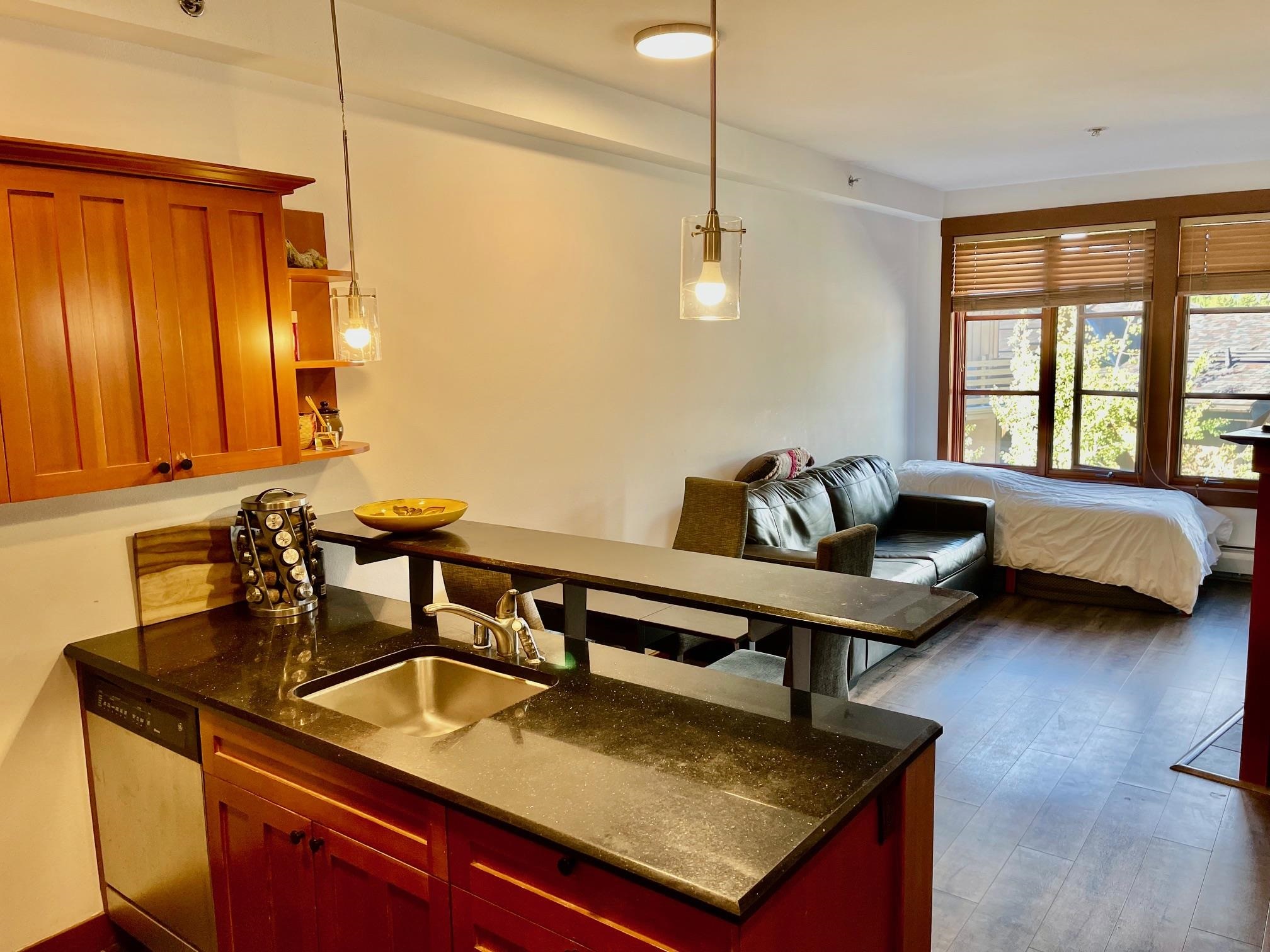 1750 Village East Road, Unit 5417 Olympic Valley, CA 96146 - Photo 2 of 18 a living room with furniture and a window