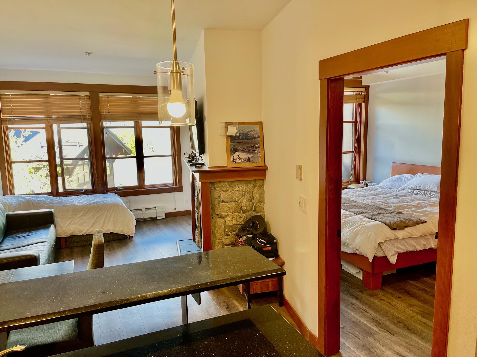 1750 Village East Road, Unit 5417 Olympic Valley, CA 96146 - Photo 4 of 18 a living room with furniture and a window