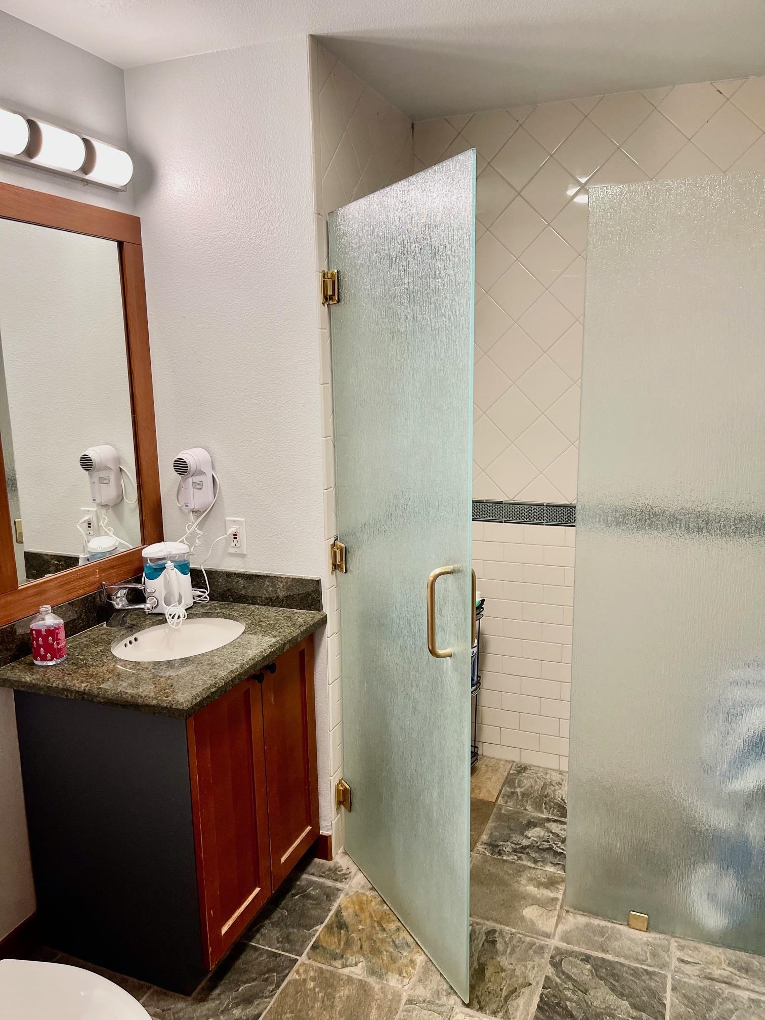 1750 Village East Road, Unit 5417 Olympic Valley, CA 96146 - Photo 9 of 18 a bathroom with a sink and a mirror