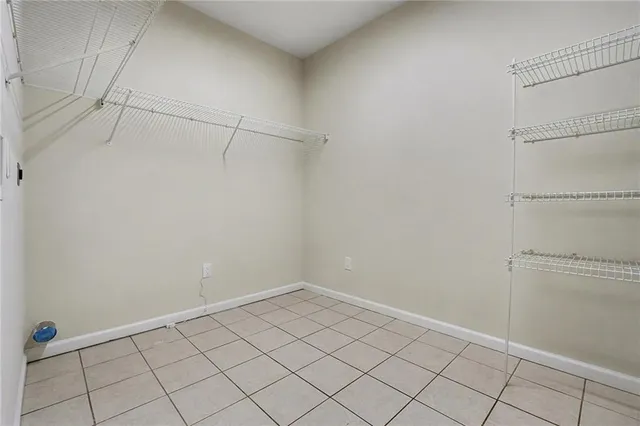 a view of a room with racks on the wall