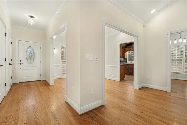 wooden floor with white walls