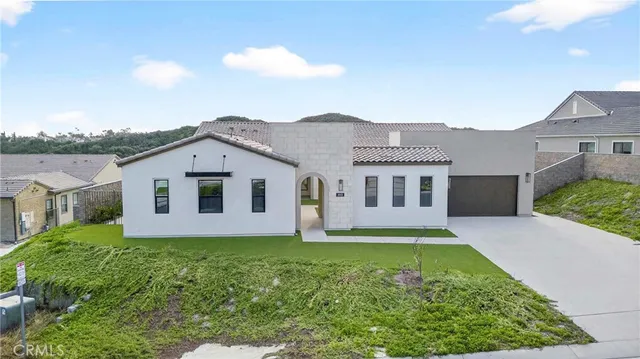 a house view with a outdoor space