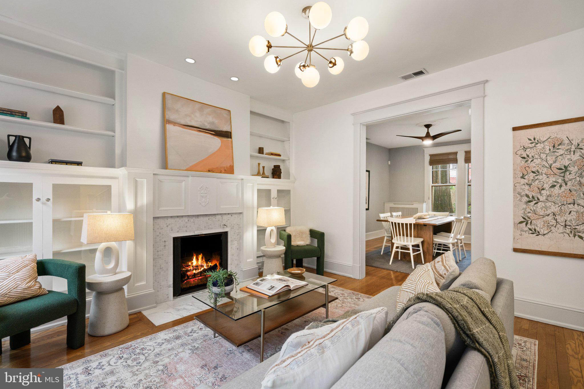 2934 Porter Street Northwest Washington, DC 20008 - Photo 4 of 33 Charming living space with cozy fireplace.