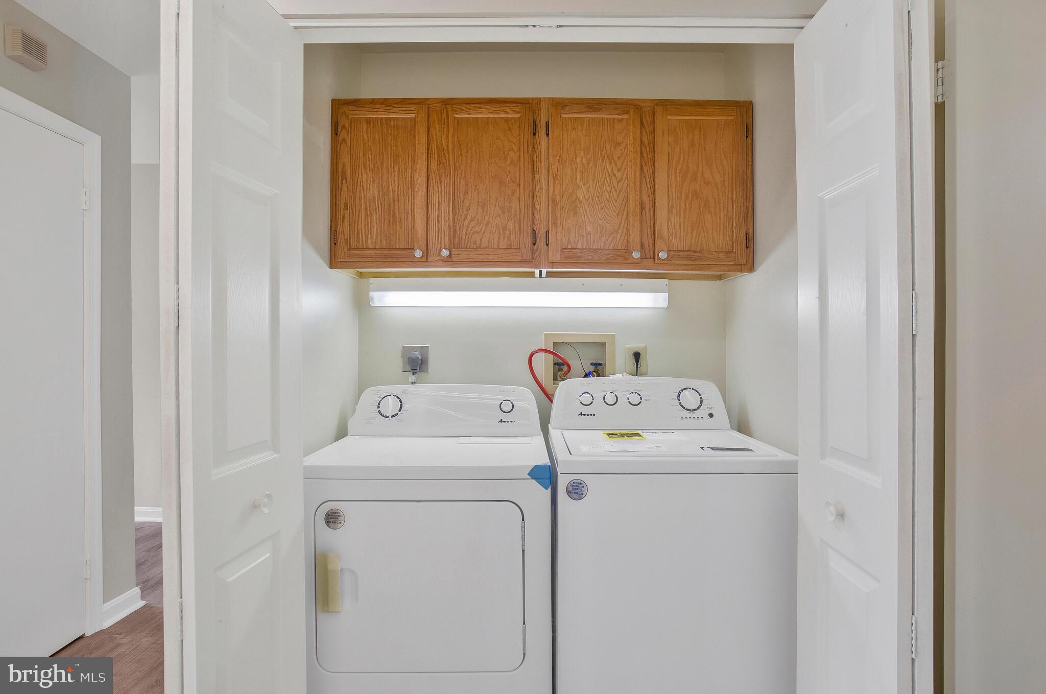 9270 Cherry Lane, Unit 66 Laurel, MD 20708 - Photo 21 of 31 New Washer and Dryer in Laundry Area