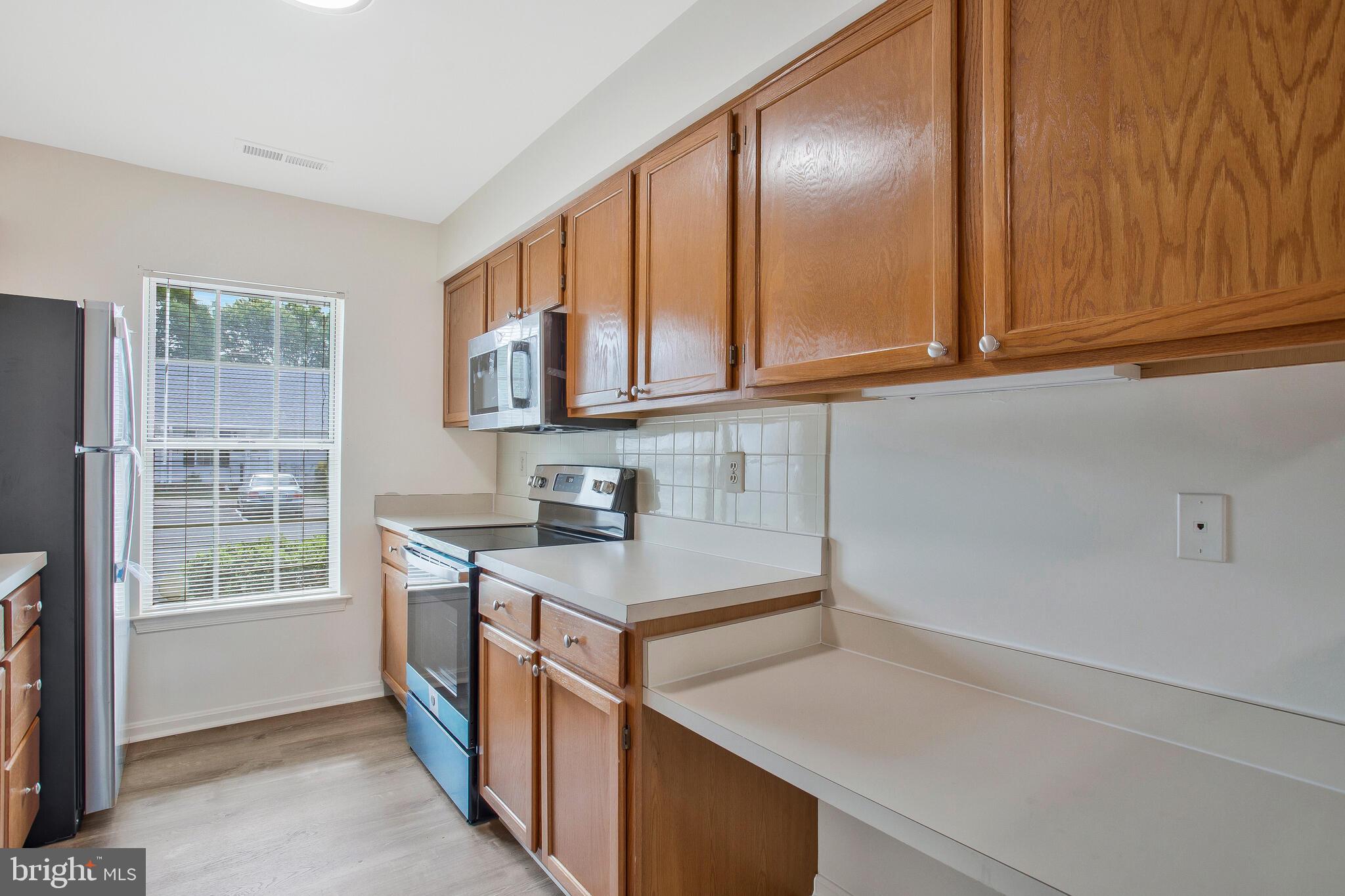 9270 Cherry Lane, Unit 66 Laurel, MD 20708 - Photo 9 of 31 Kitchen w/ Great Cabinet Space
