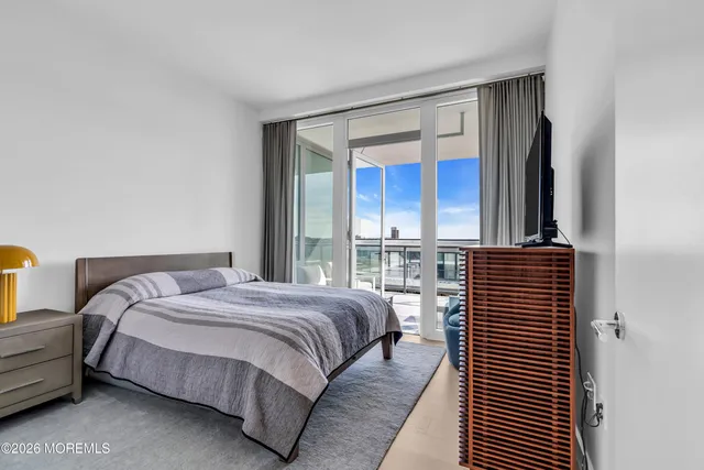 a bathroom with a toilet a sink and bathtub