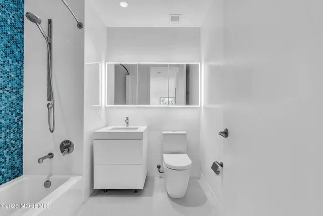 a view of a balcony with an ocean view