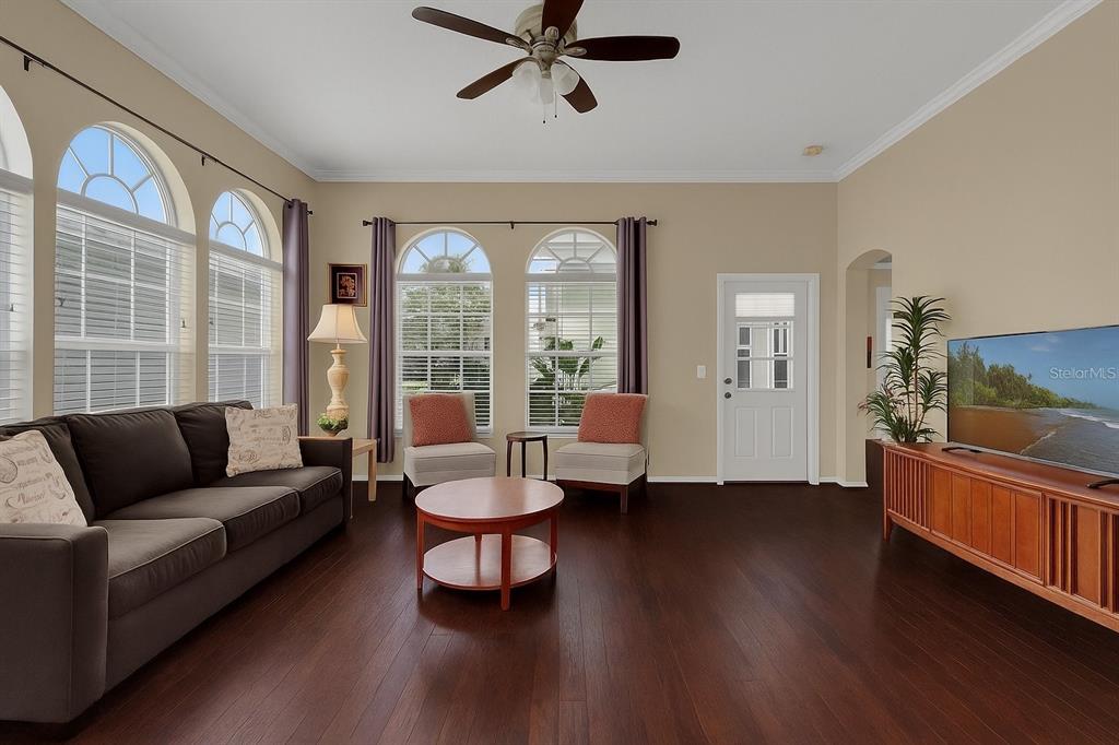 604 Nadina Place Celebration, FL 34747 - Photo 11 of 32 a living room with furniture and a large window
