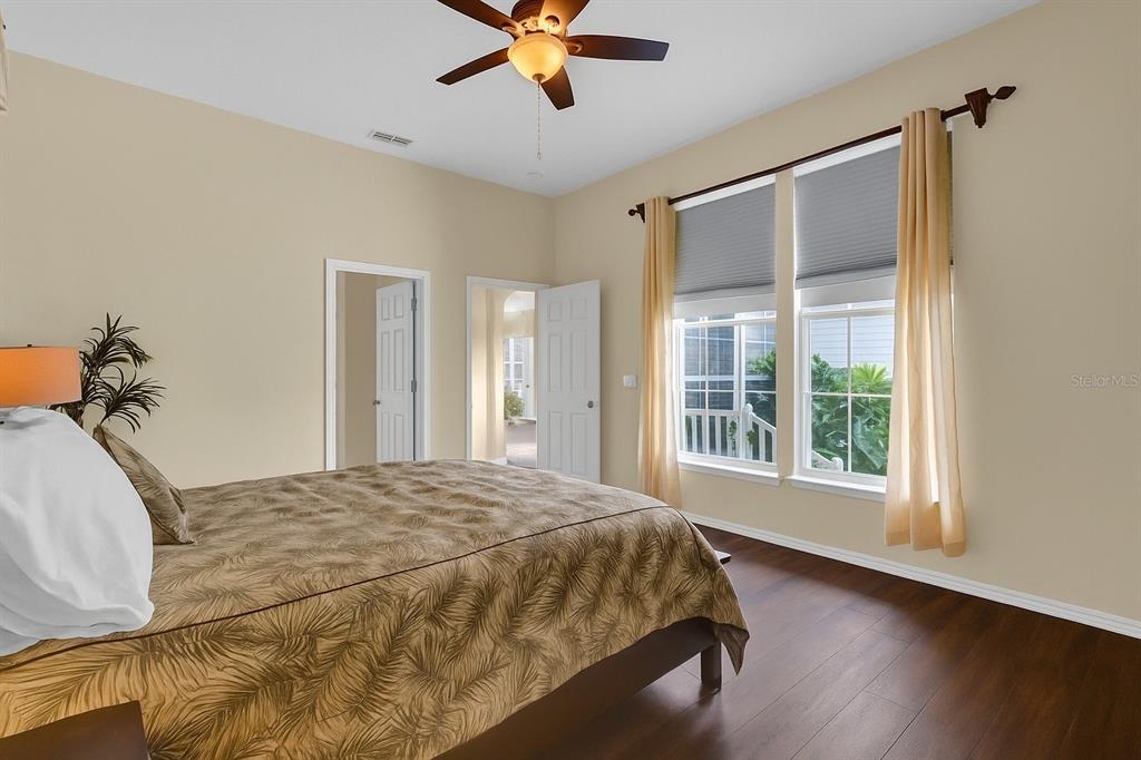 604 Nadina Place Celebration, FL 34747 - Photo 15 of 32 a bedroom with a bed and a window