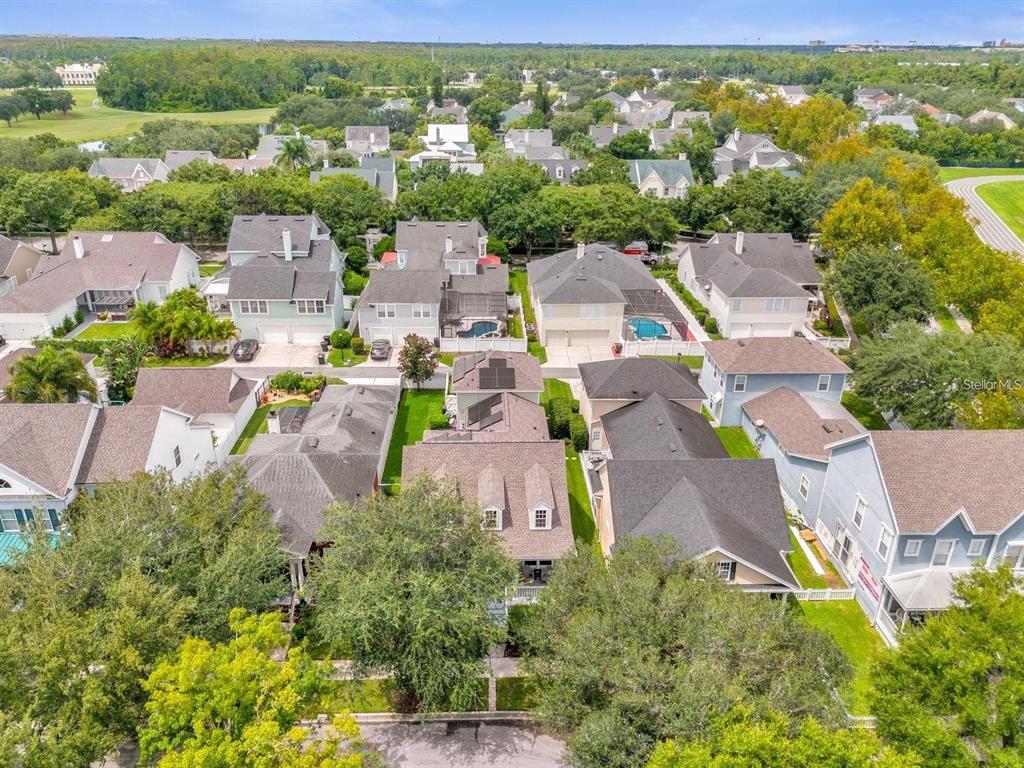604 Nadina Place Celebration, FL 34747 - Photo 32 of 32 an aerial view of residential houses with outdoor space and street view