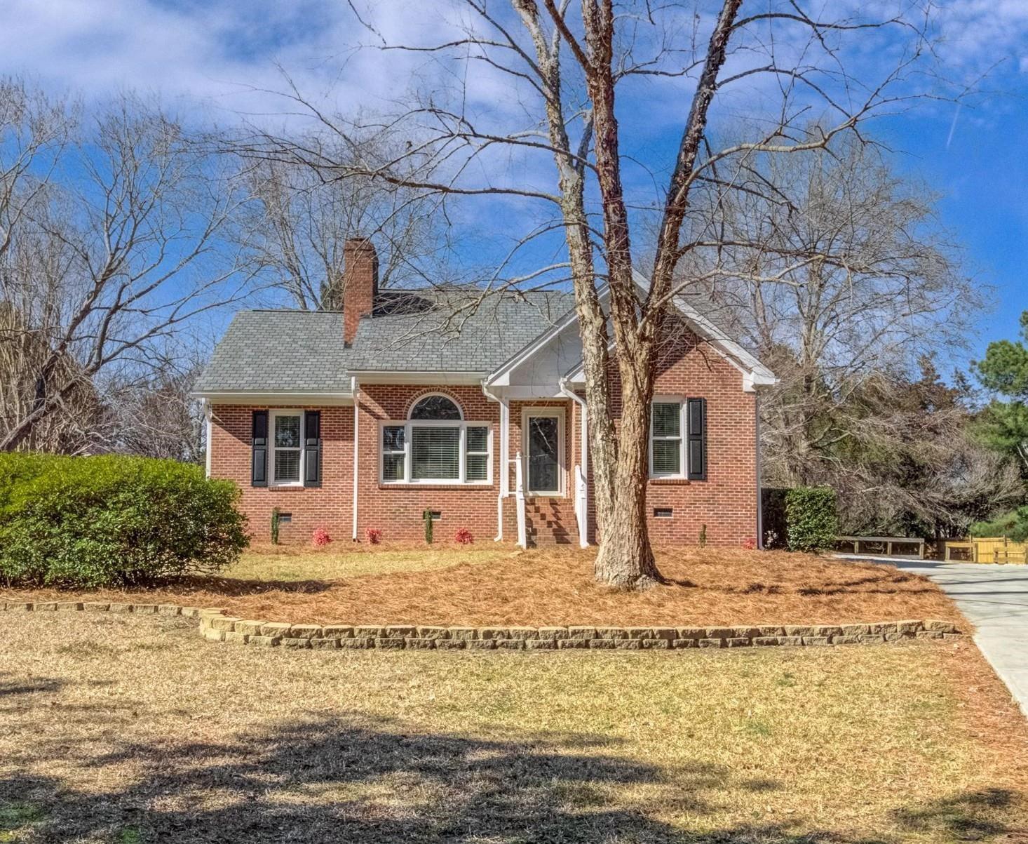 9305 Tallgrass Road Raleigh, NC 27603 - Photo 3 of 49 No HOA! No city taxes! No Water or Sewer Bills! .69 acre culdesac lot! Partially Fenced! Exterior Front