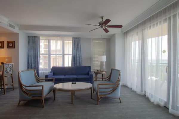 a living room with furniture and a window