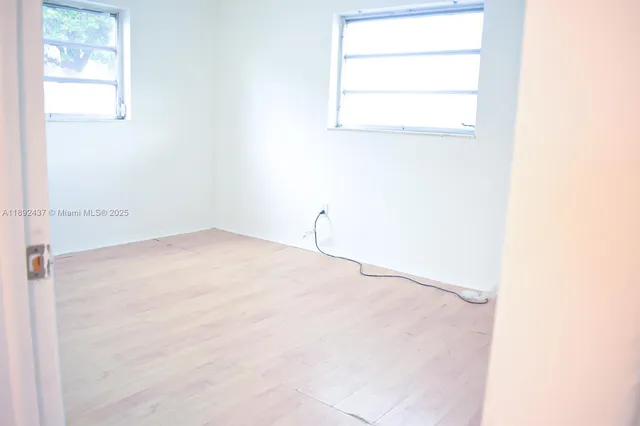 a view of a room with a window