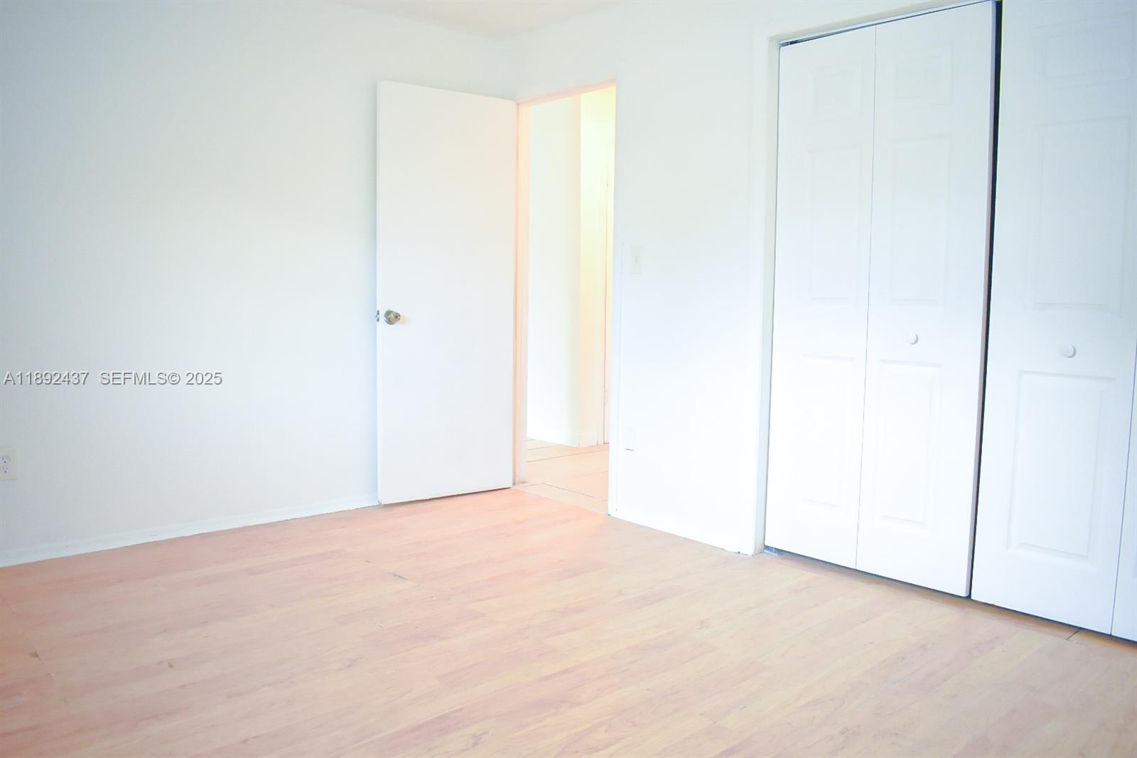 2265 Northwest 98th Street, Unit 2265 Miami, FL 33147 - Photo 6 of 15 a view of an empty room