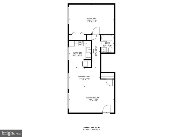 a picture of a bench in front of a wall