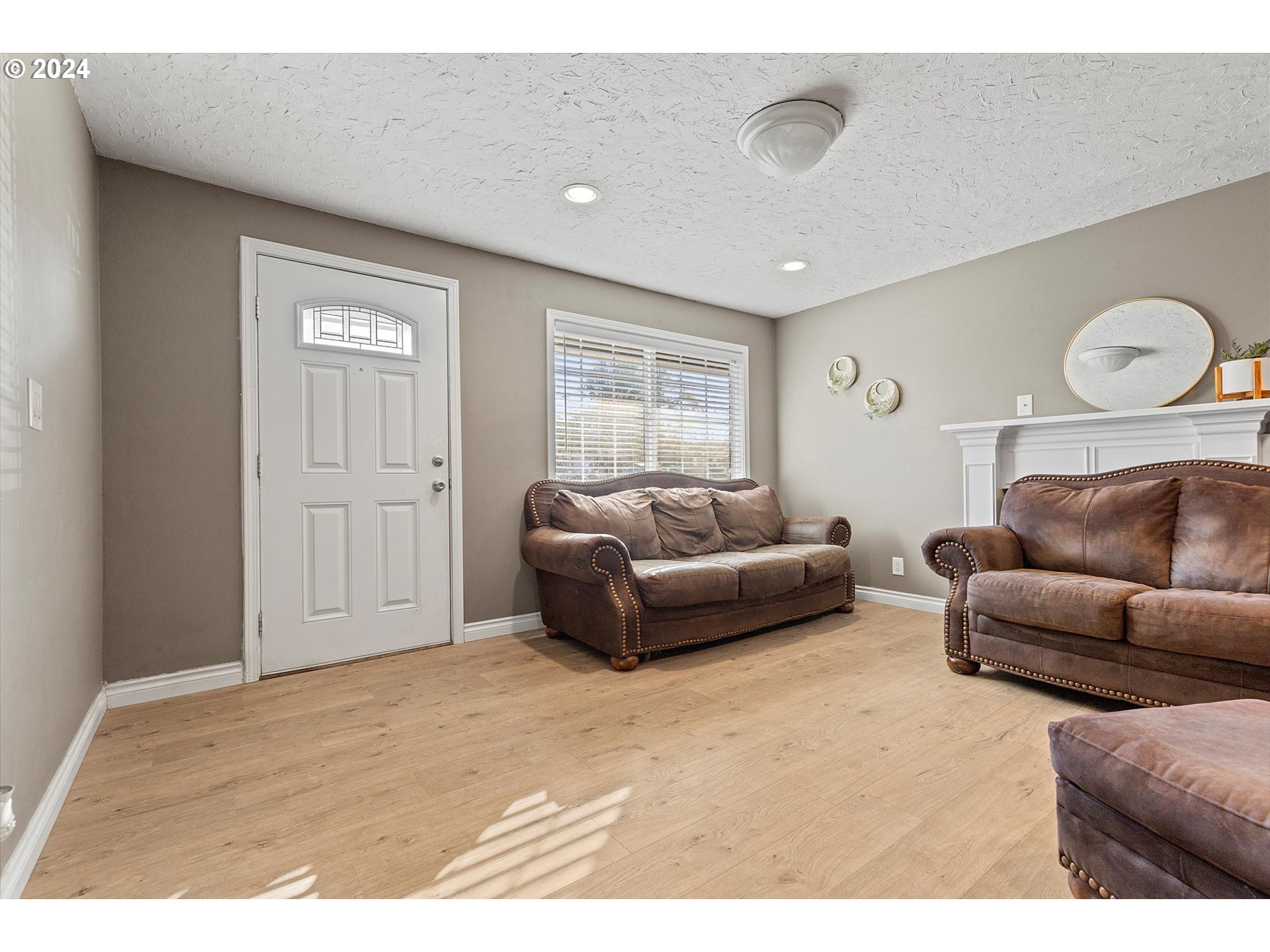 3825 Southeast 6th Street Gresham, OR 97080 - Photo 11 of 37 a living room with furniture and a window