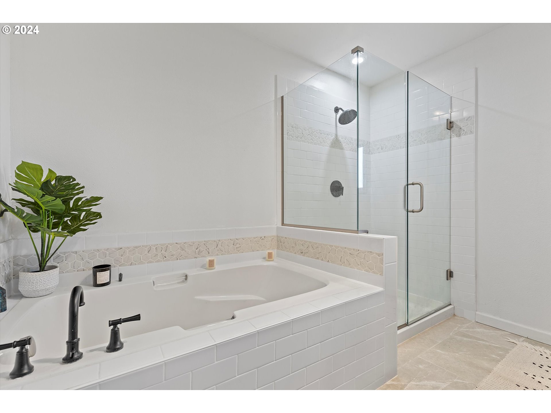 3825 Southeast 6th Street Gresham, OR 97080 - Photo 16 of 37 a bathroom with a tub sink and mirror