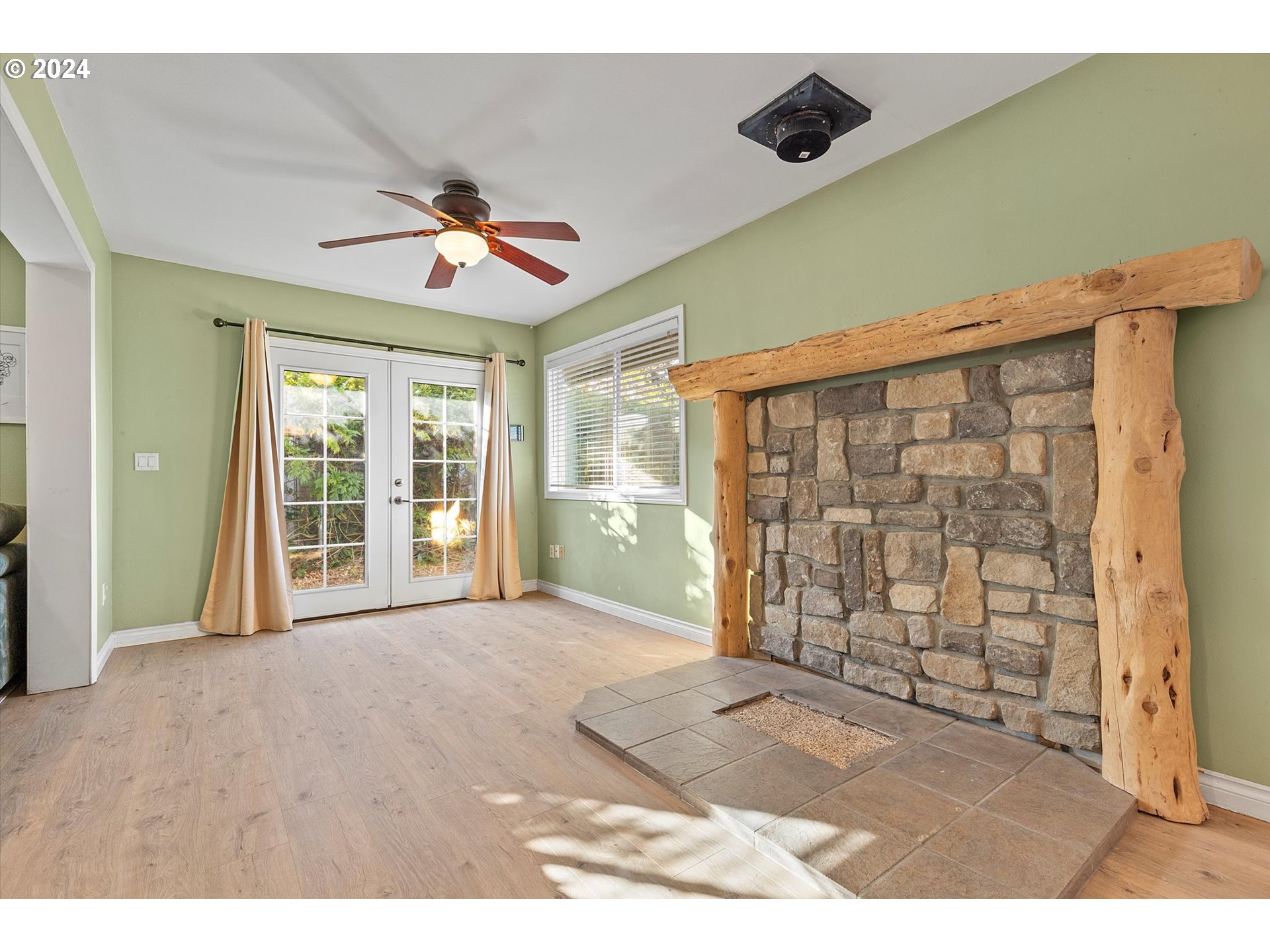 3825 Southeast 6th Street Gresham, OR 97080 - Photo 24 of 37 a view of an empty room with a window