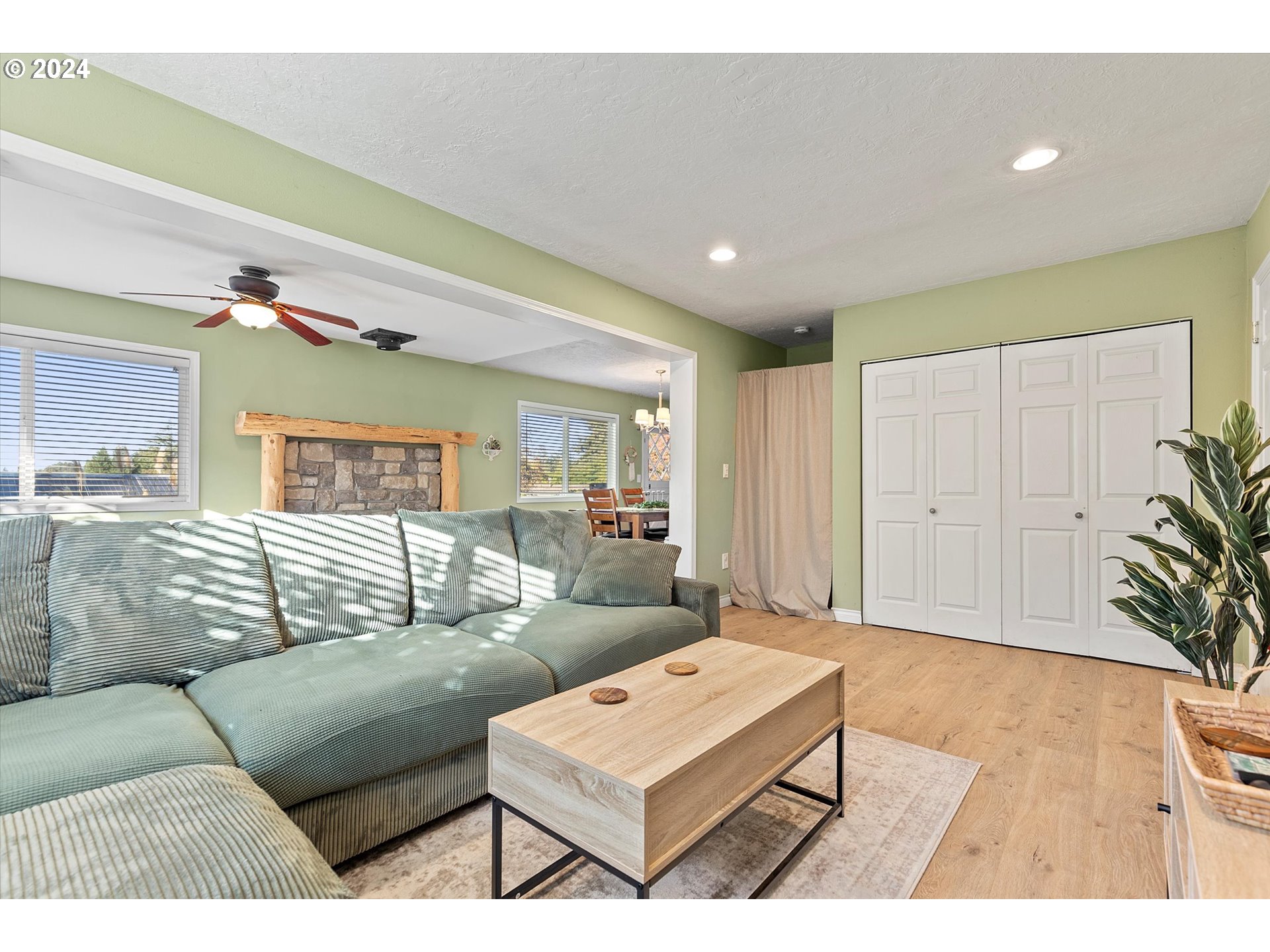3825 Southeast 6th Street Gresham, OR 97080 - Photo 28 of 37 a living room with furniture and wooden floor