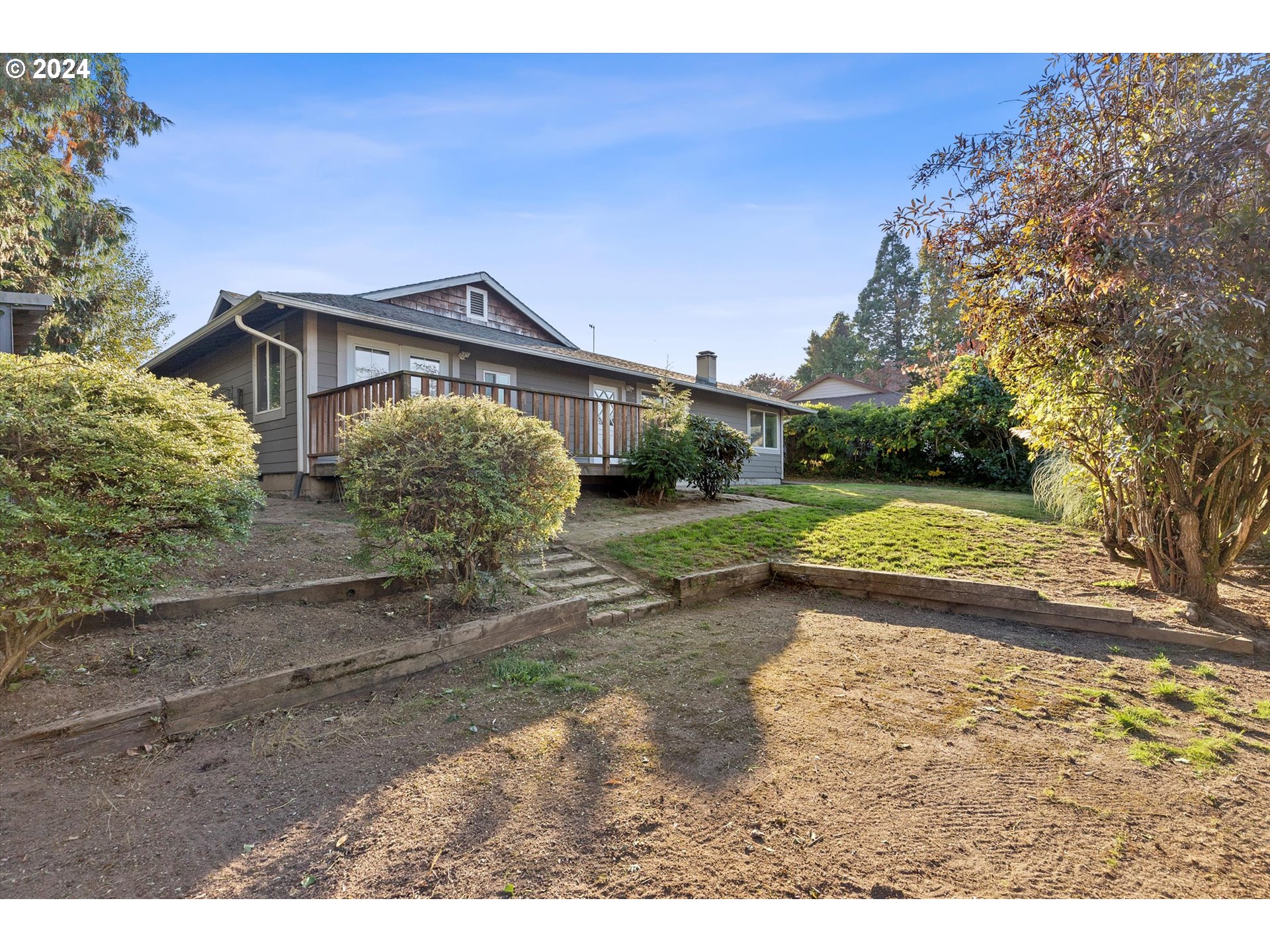 3825 Southeast 6th Street Gresham, OR 97080 - Photo 34 of 37 a front view of a house with garden
