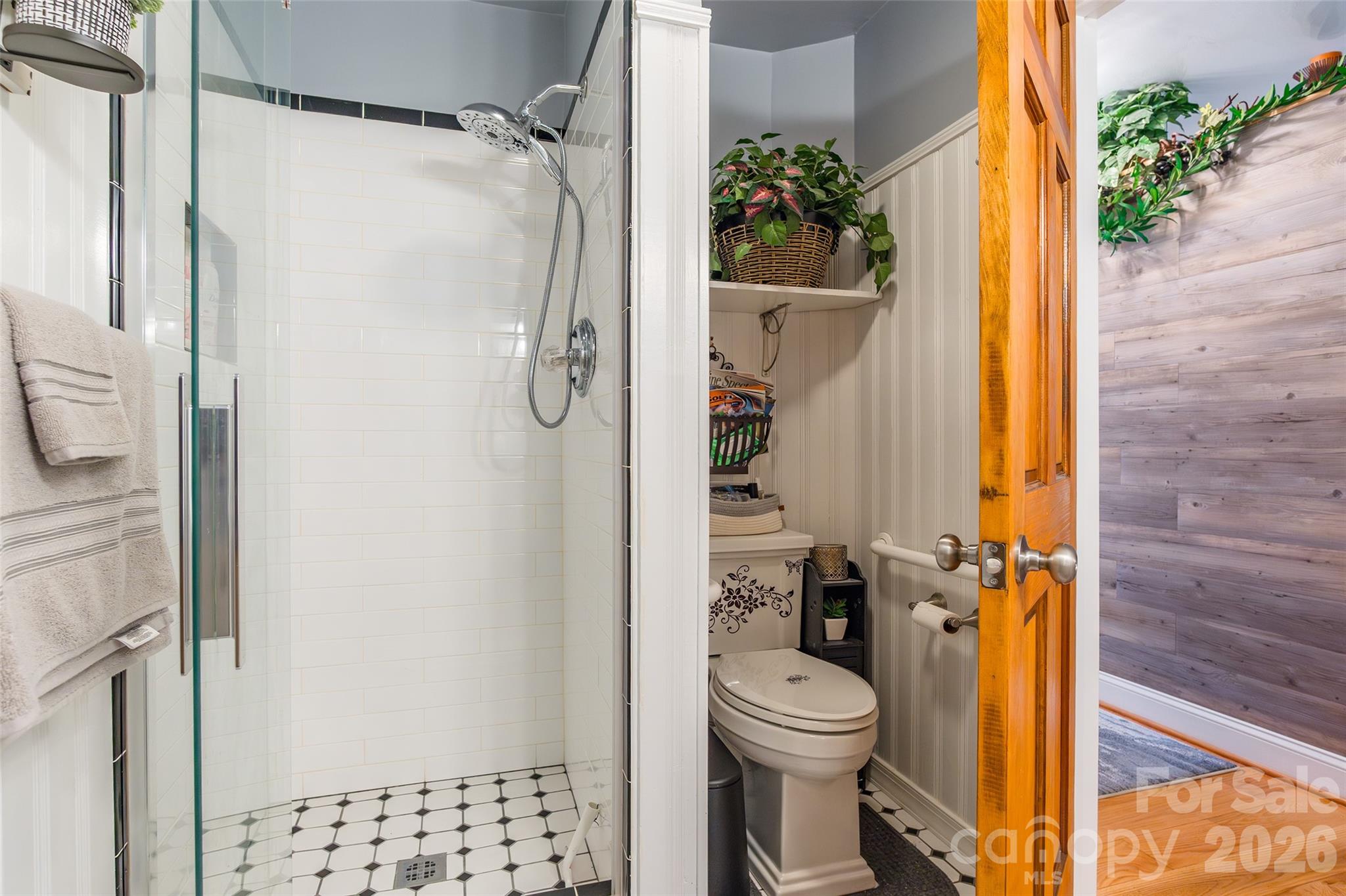 4205 Lake Shore Road South Denver, NC 28037 - Photo 20 of 46 a bathroom with a toilet and a shower