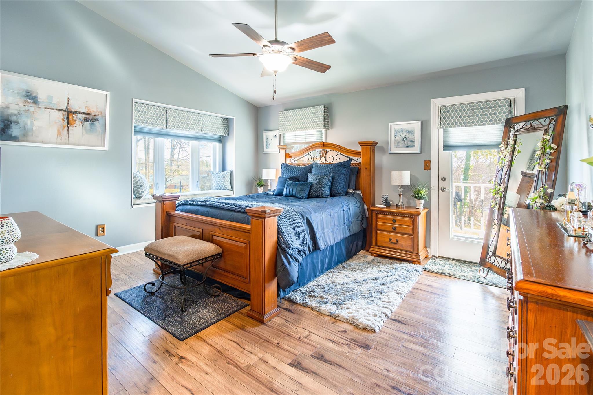 4205 Lake Shore Road South Denver, NC 28037 - Photo 21 of 46 a bedroom with a bed and wooden floor