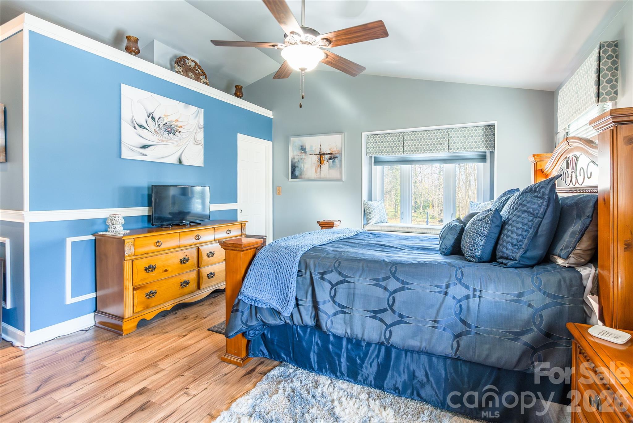 4205 Lake Shore Road South Denver, NC 28037 - Photo 22 of 46 a bedroom with a bed and a walk in closet