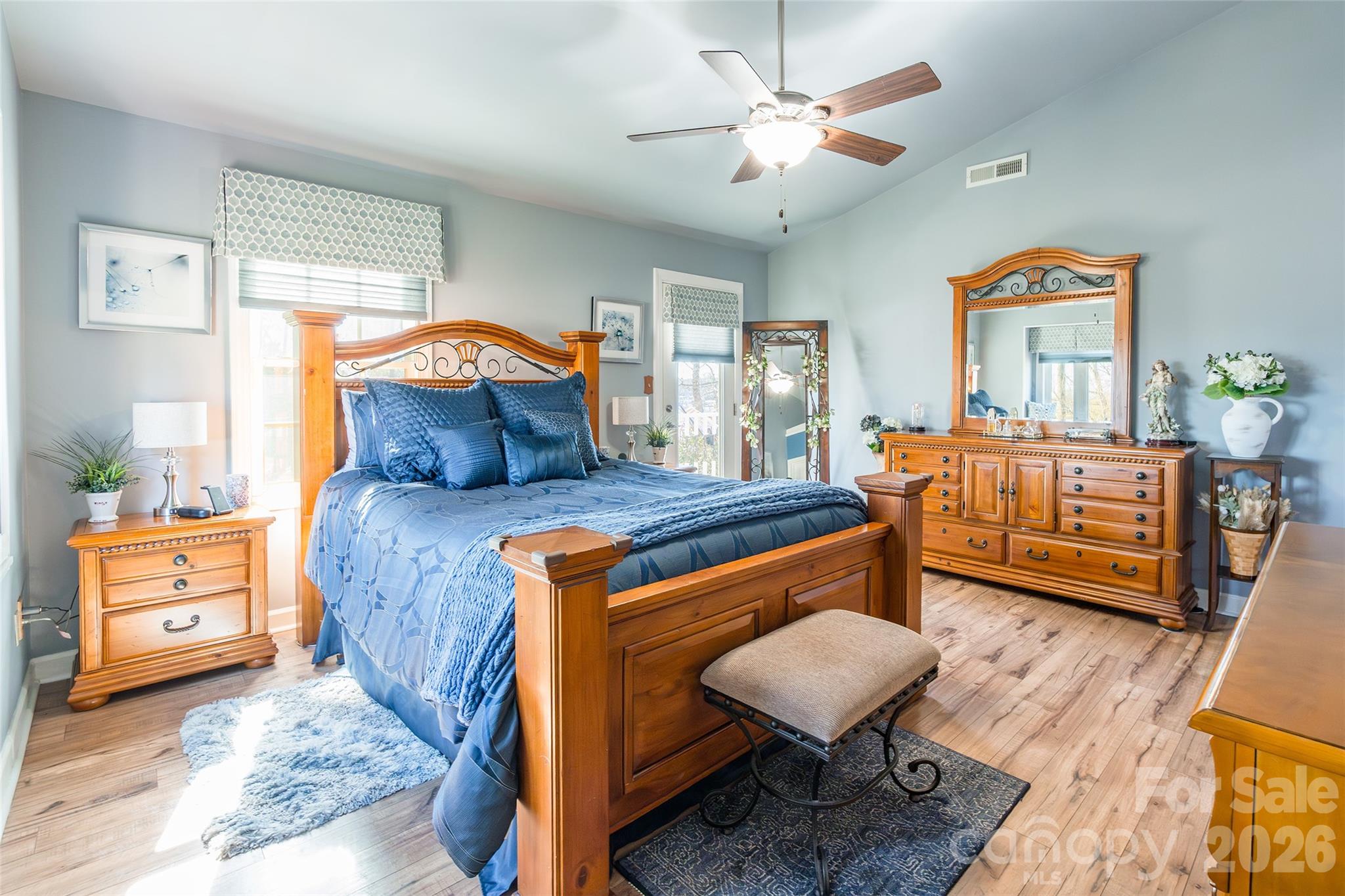 4205 Lake Shore Road South Denver, NC 28037 - Photo 23 of 46 a bedroom with a bed and wooden floor