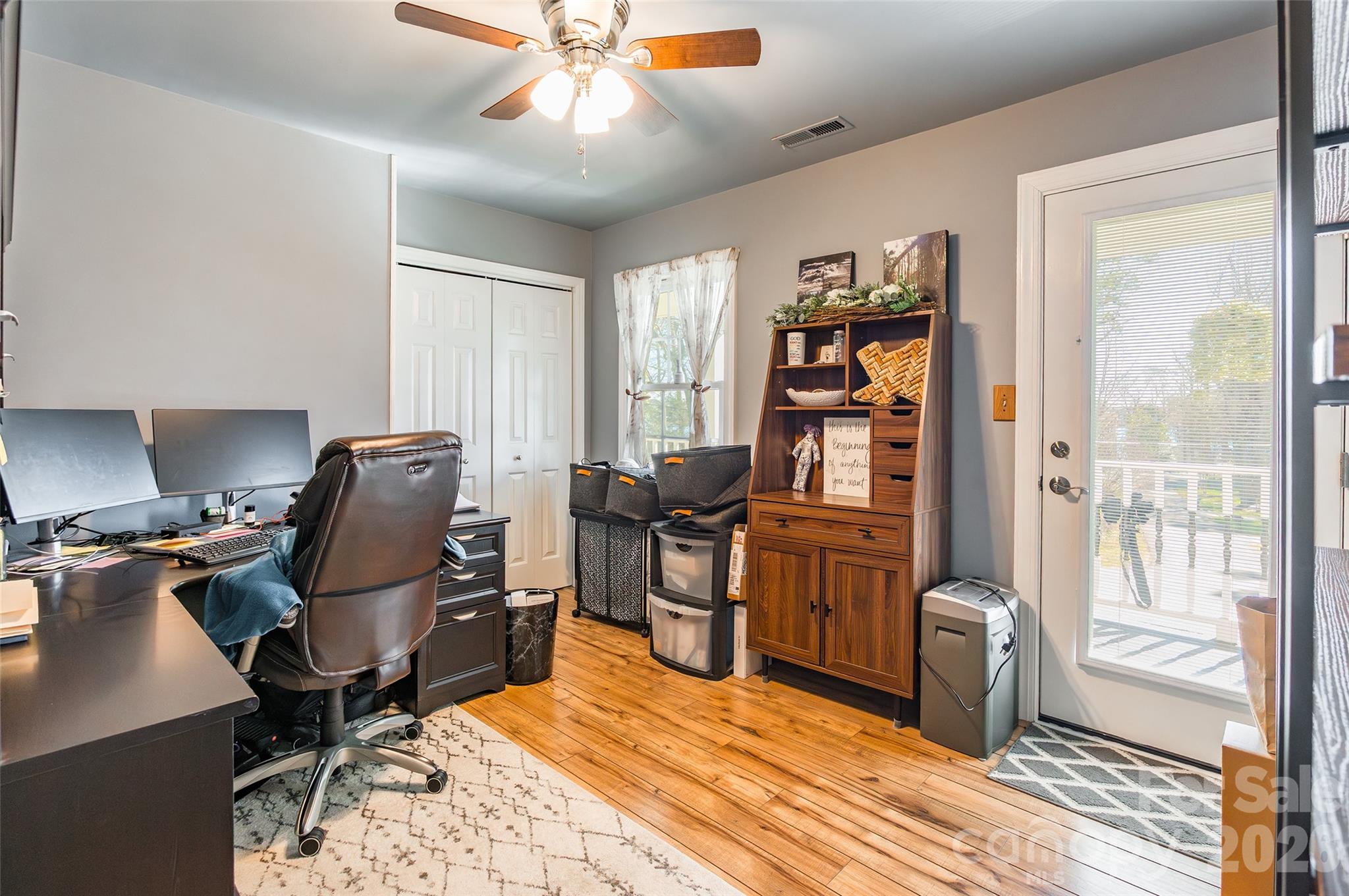 4205 Lake Shore Road South Denver, NC 28037 - Photo 28 of 46 a view of a workspace with furniture and a window