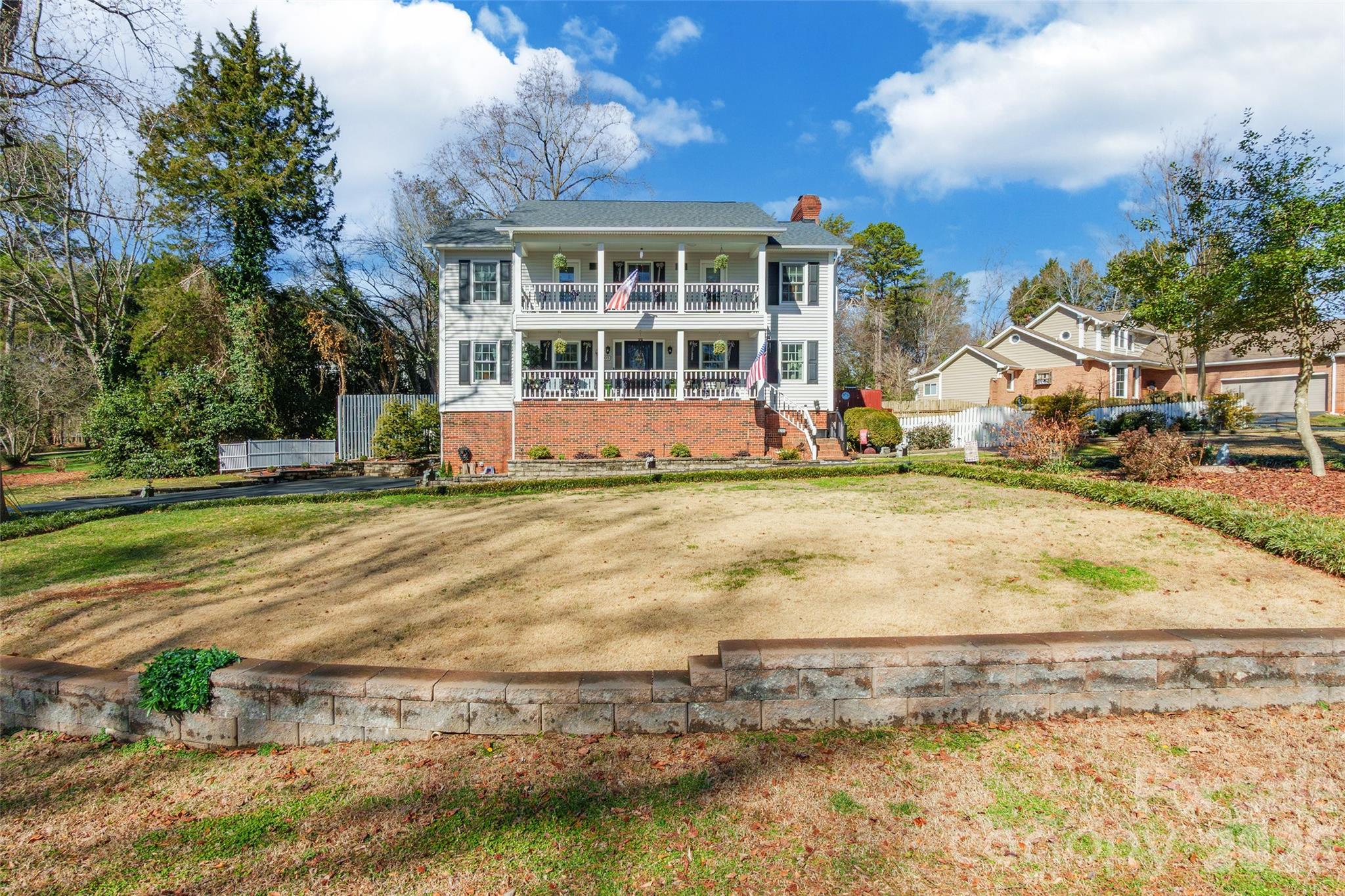 4205 Lake Shore Road South Denver, NC 28037 - Photo 3 of 46 a view of a house with a swimming pool