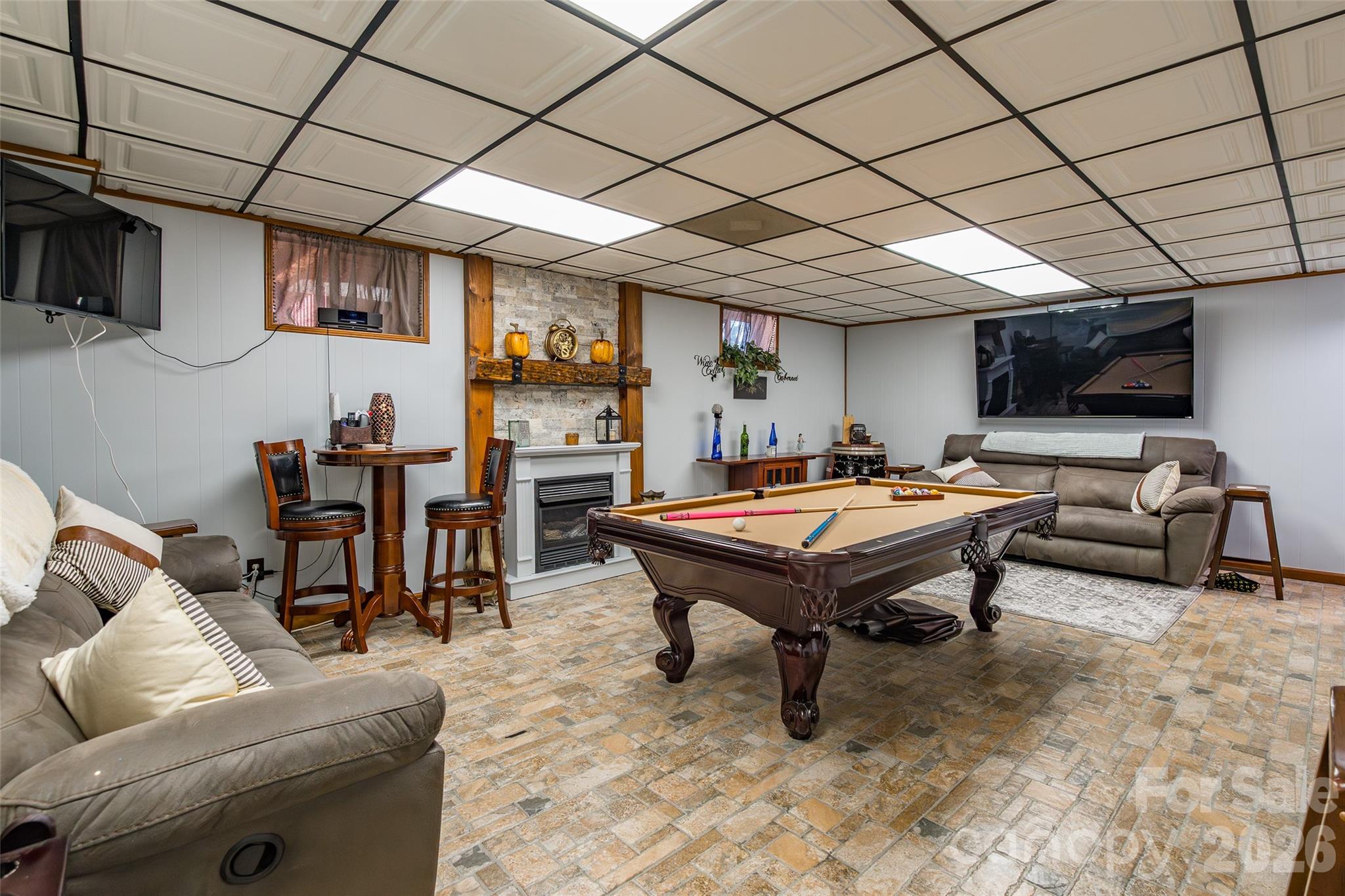 4205 Lake Shore Road South Denver, NC 28037 - Photo 34 of 46 a living room with furniture pool table and a flat screen tv