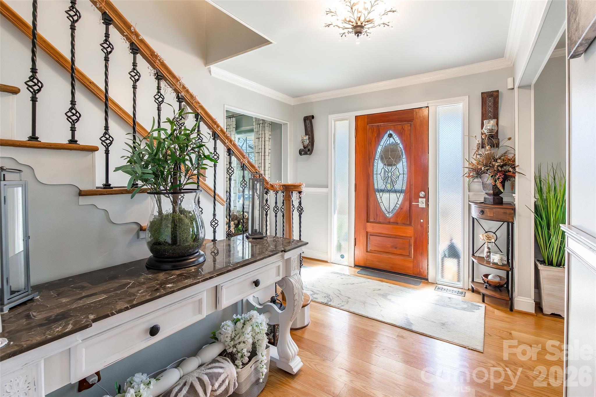 4205 Lake Shore Road South Denver, NC 28037 - Photo 6 of 46 a view of an entryway with wooden floor and stairs