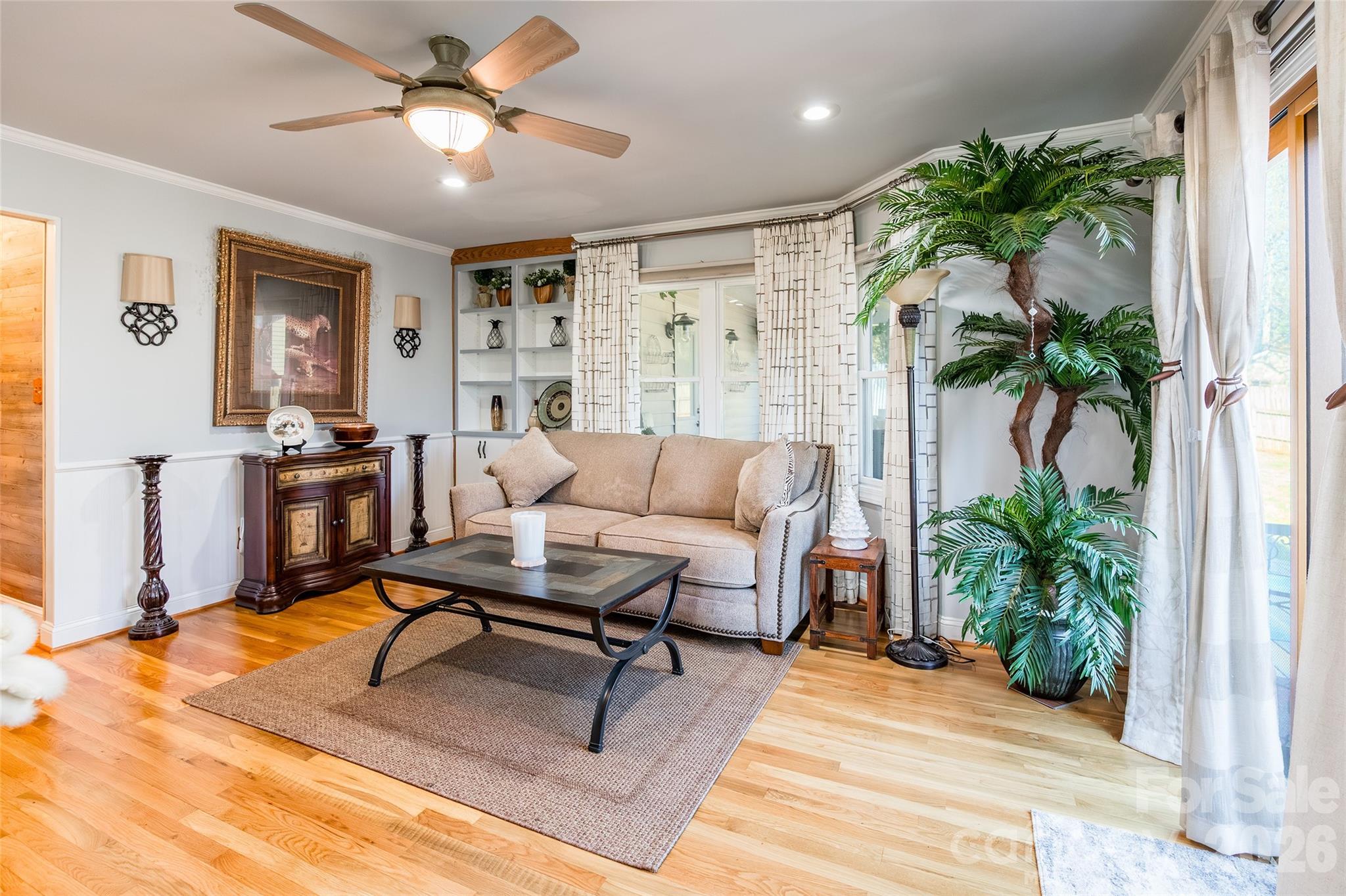 4205 Lake Shore Road South Denver, NC 28037 - Photo 10 of 46 a living room with furniture and a potted plant
