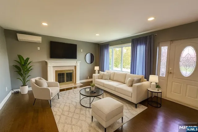 a bedroom with bed and a chandelier