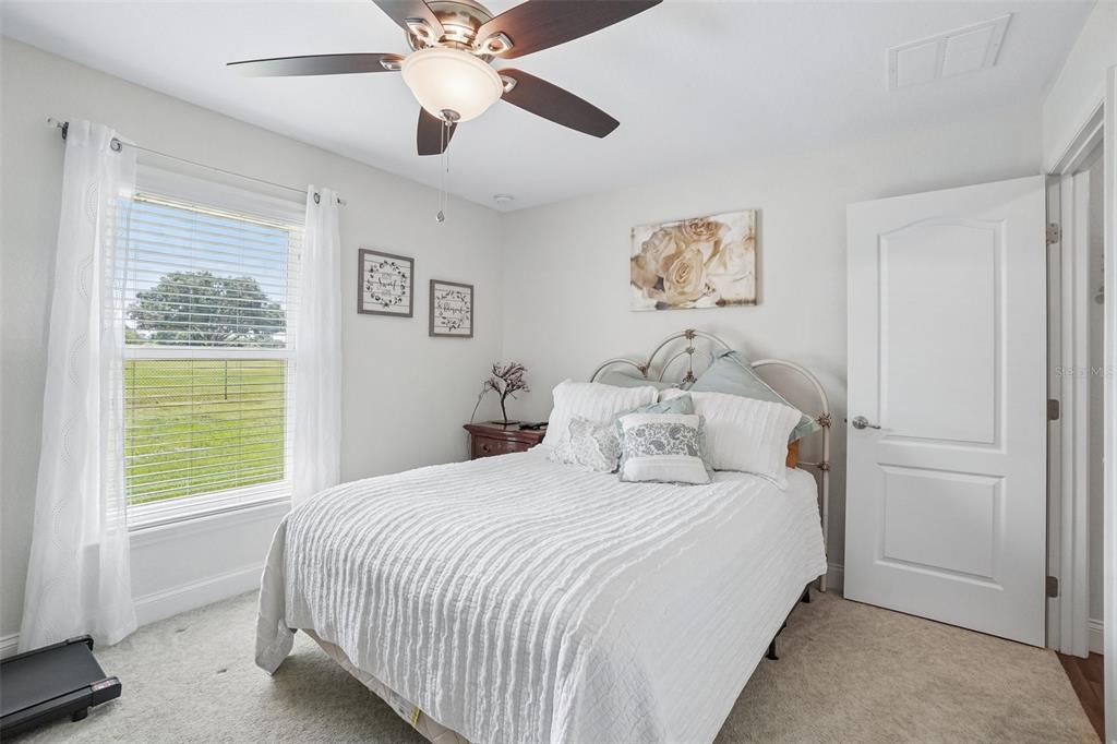 3934 Connersville Road Bartow, FL 33830 - Photo 45 of 81 a bedroom with a large bed and a window