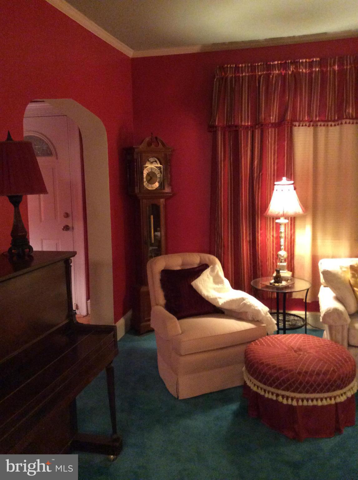 2700 Allendale Road Baltimore, MD 21216 - Photo 7 of 30 a bedroom with furniture and a lamp