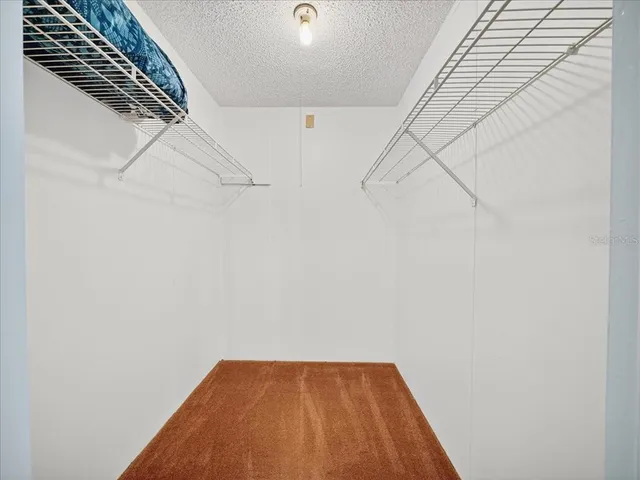 a view of a room with racks on the wall