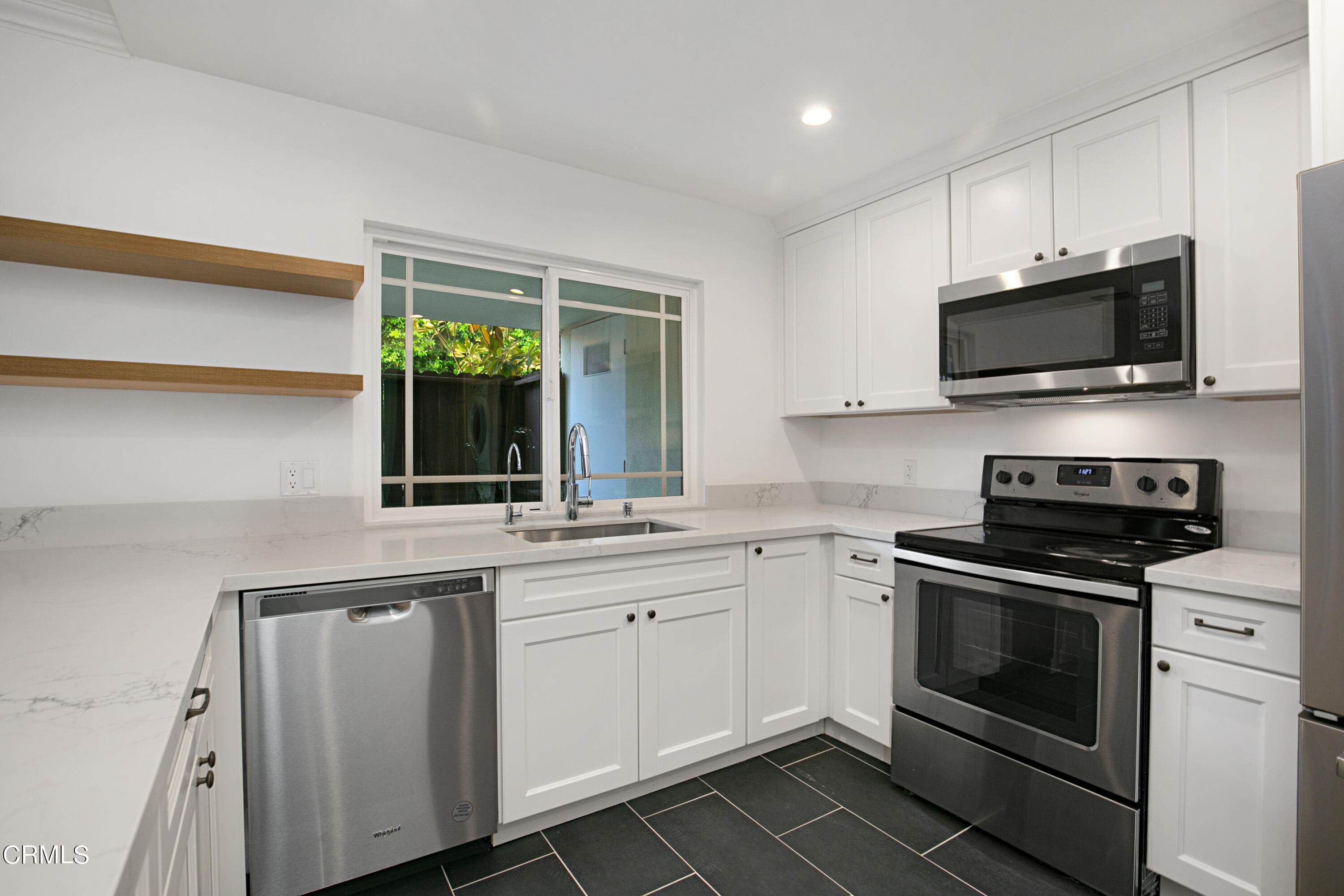 1429 Valley View Road, Unit 13 Glendale, CA 91202 - Photo 15 of 33 a kitchen with a sink stove and microwave