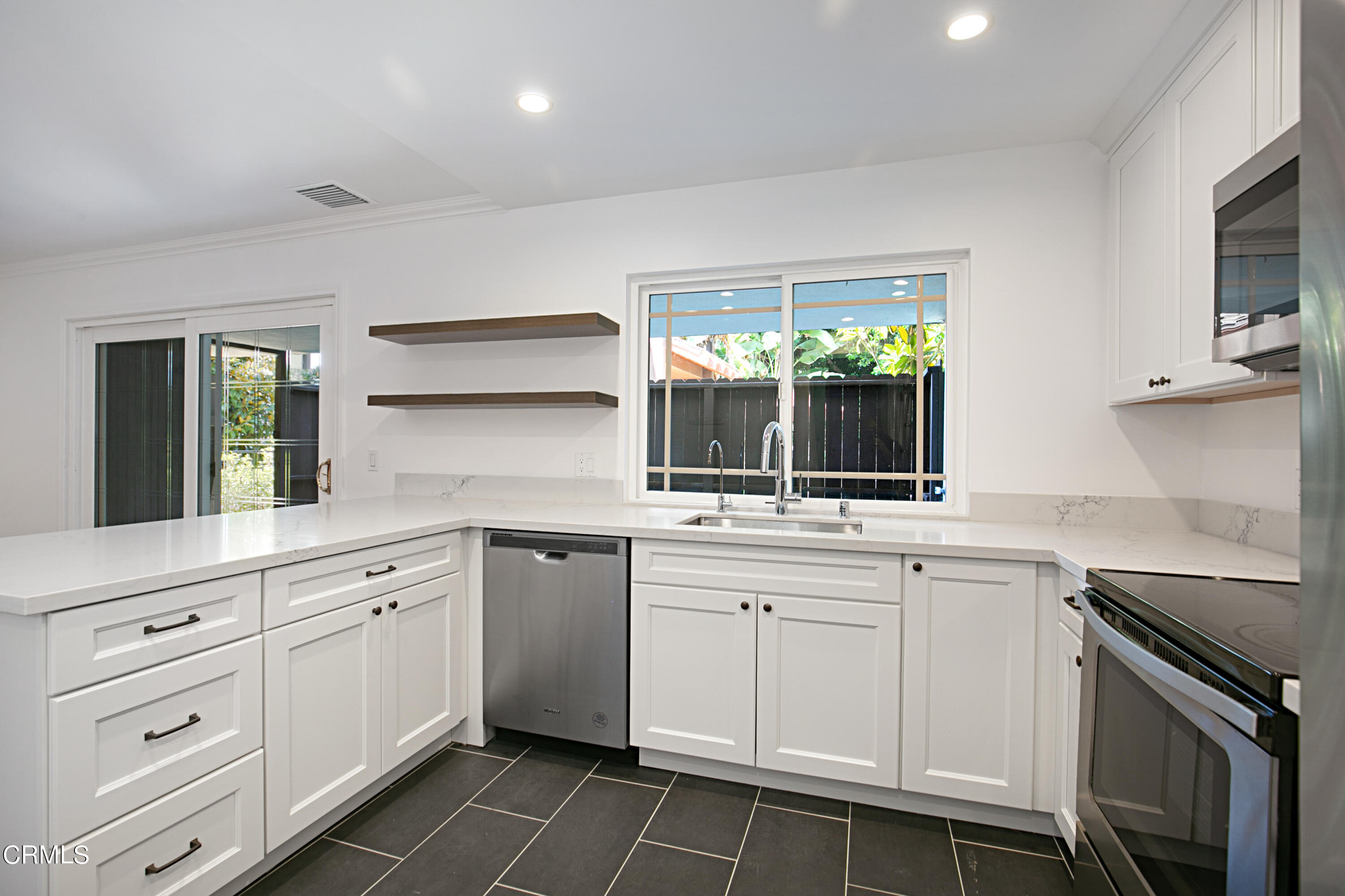 1429 Valley View Road, Unit 13 Glendale, CA 91202 - Photo 18 of 33 a kitchen with a sink stove and microwave