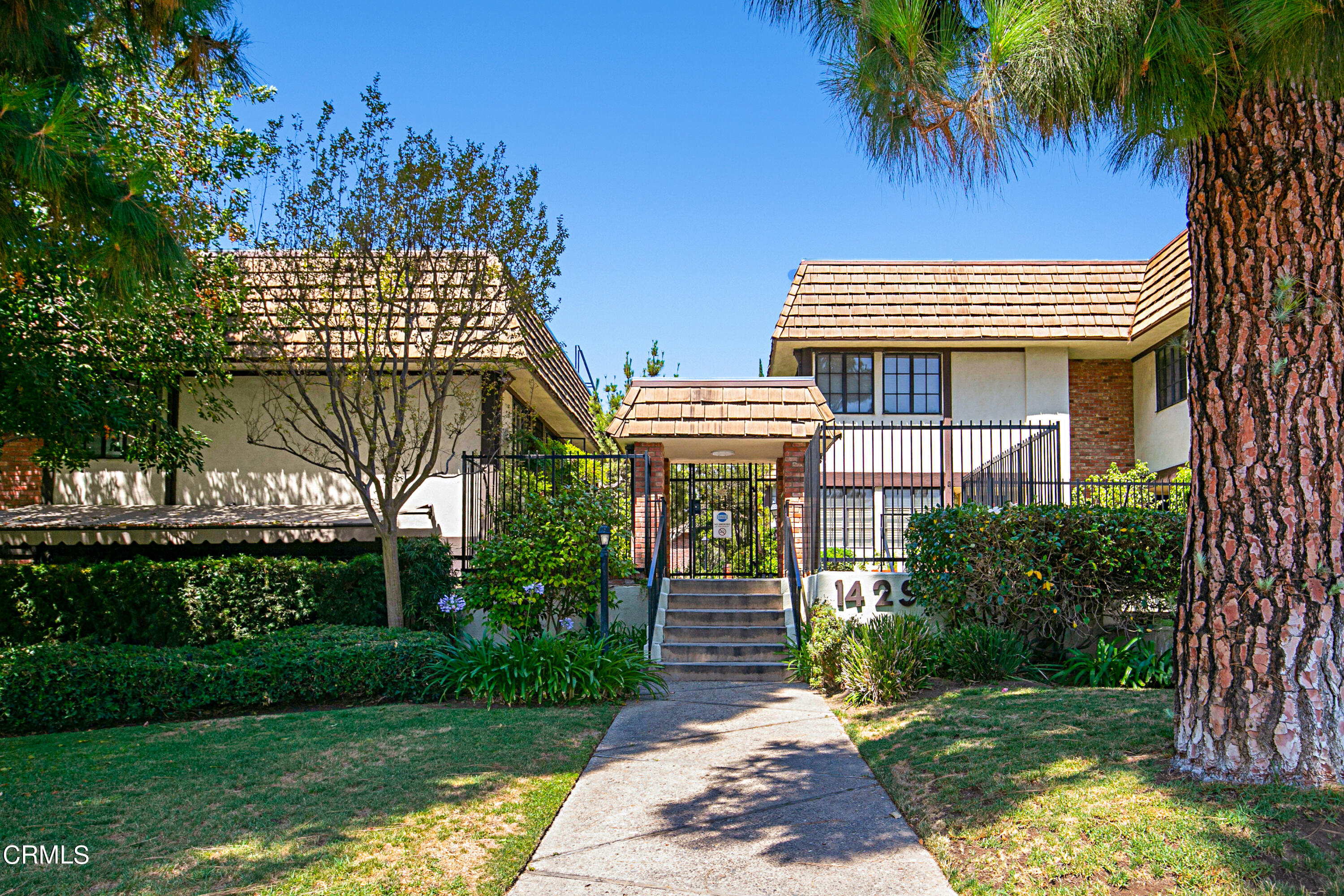 1429 Valley View Road, Unit 13 Glendale, CA 91202 - Photo 2 of 33 a front view of a house with a garden