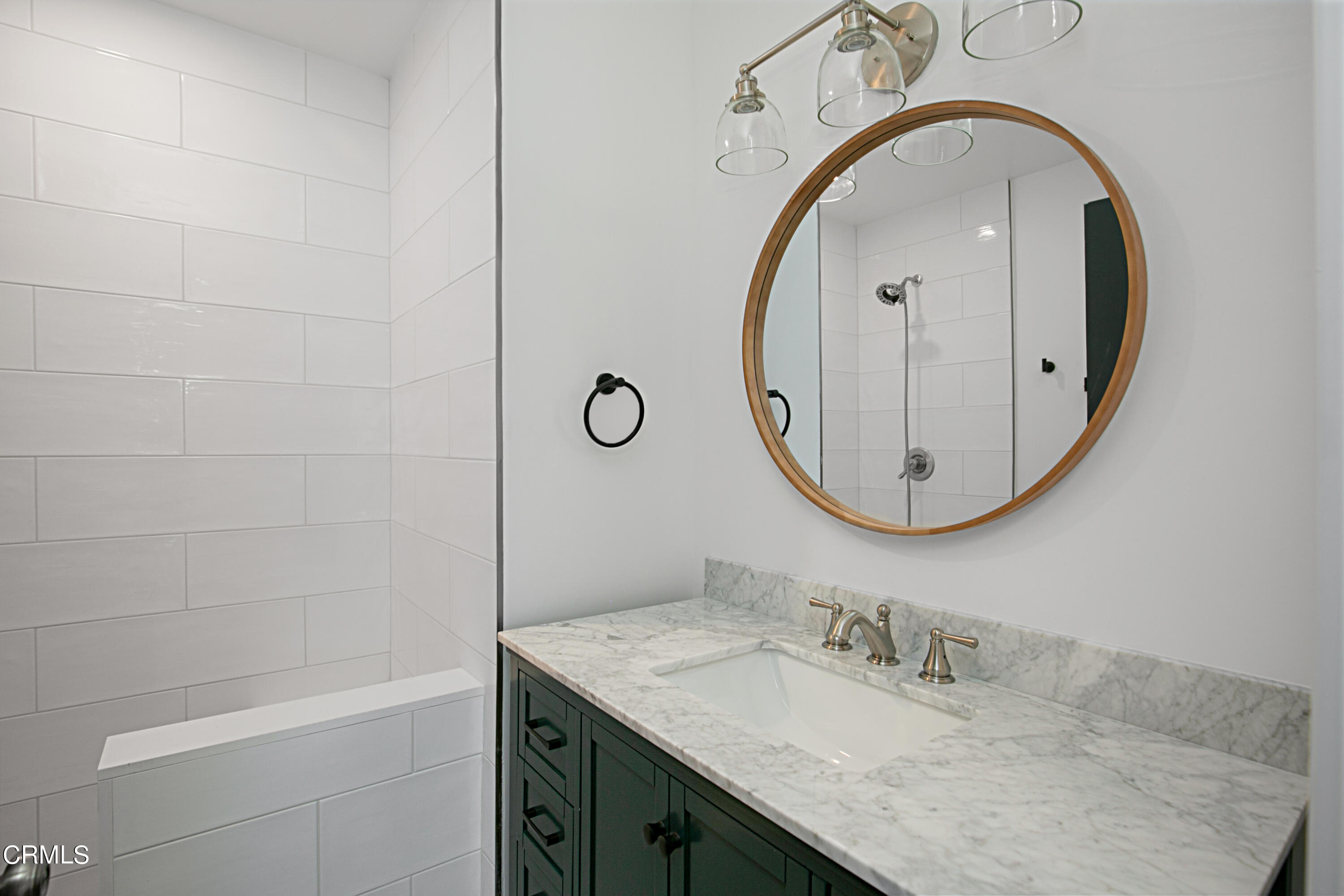 1429 Valley View Road, Unit 13 Glendale, CA 91202 - Photo 29 of 33 a bathroom with a granite countertop sink a mirror and shower