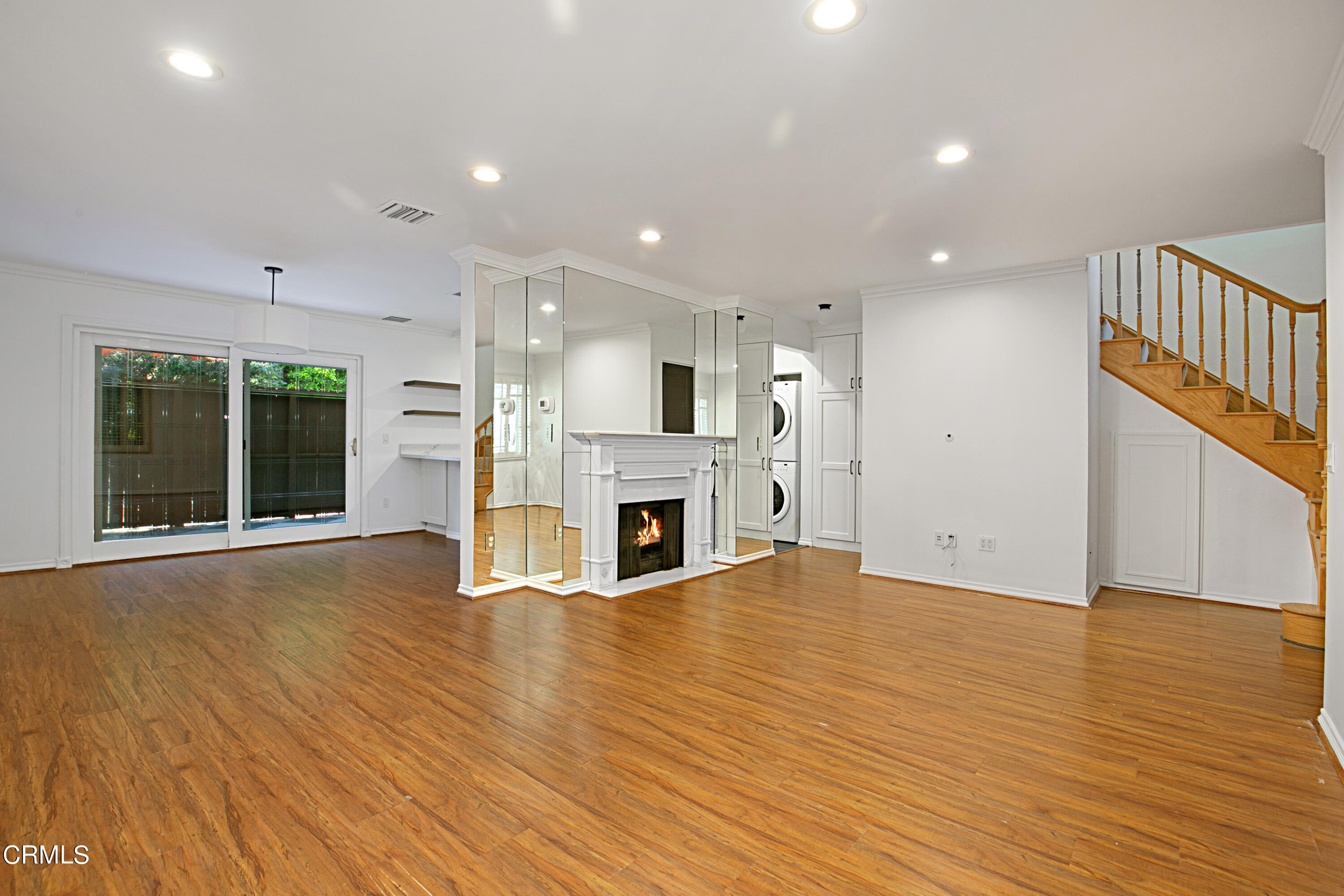 1429 Valley View Road, Unit 13 Glendale, CA 91202 - Photo 8 of 33 a view of a livingroom with fireplace wooden floor and window