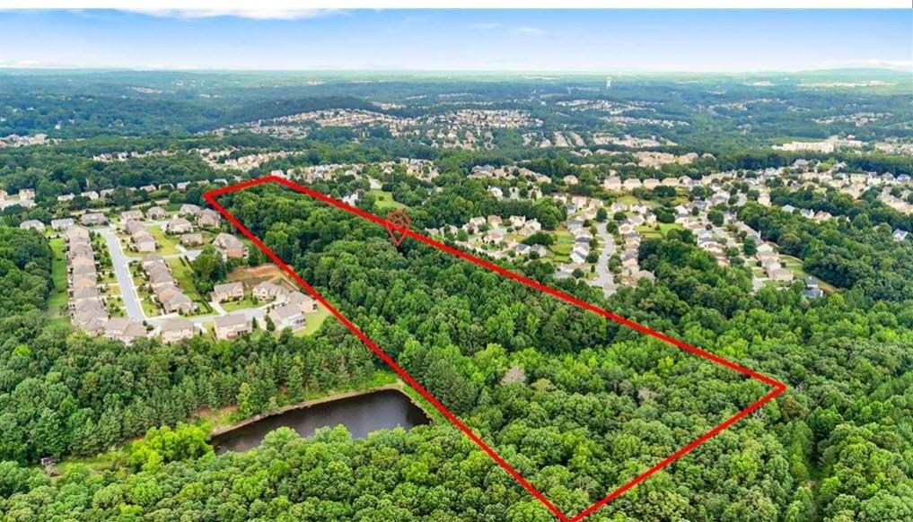 451 Nichols Drive Suwanee, GA 30024 - Photo 13 of 22 an aerial view of residential houses with outdoor space and trees