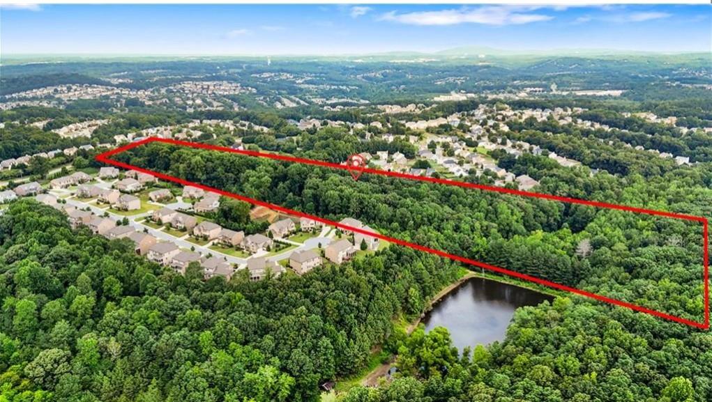 451 Nichols Drive Suwanee, GA 30024 - Photo 14 of 22 an aerial view of residential houses with outdoor space and swimming pool