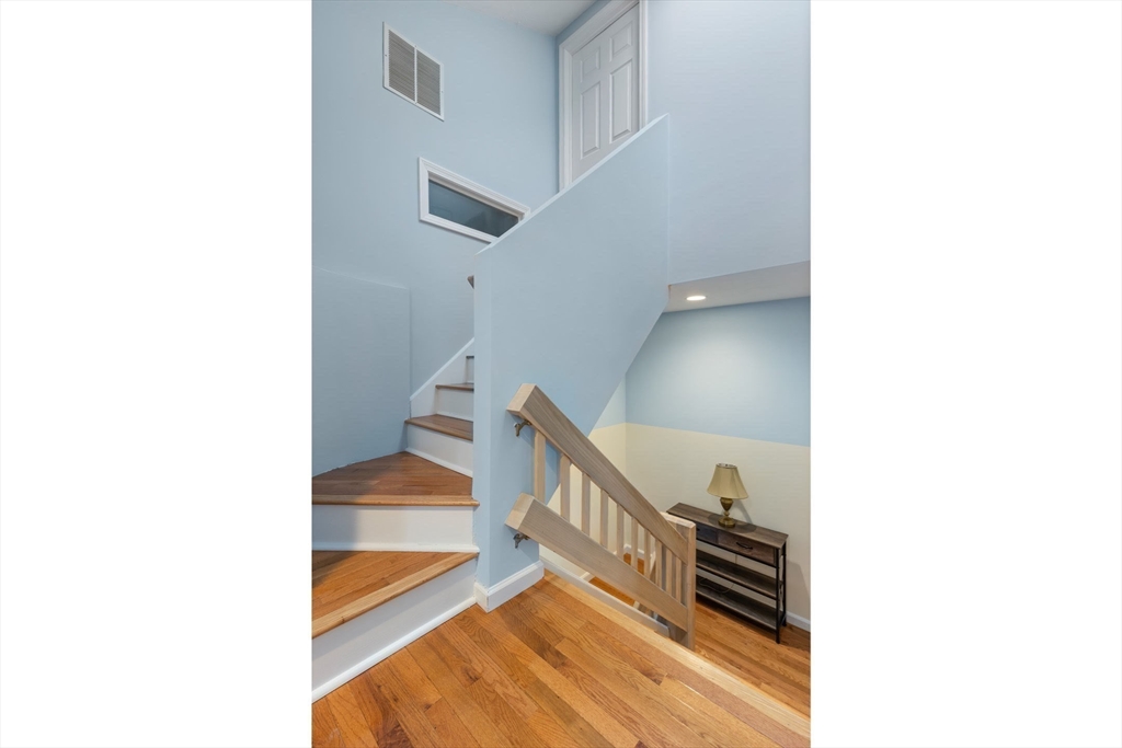 2 Arrowhead Circle, Unit 2 Ashland, MA 01721 - Photo 20 of 22 a view of a hallway with staircase