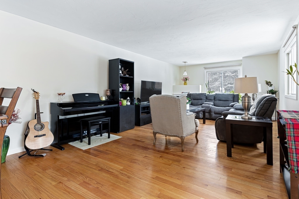 2 Arrowhead Circle, Unit 2 Ashland, MA 01721 - Photo 7 of 22 a living room with furniture piano and a piano