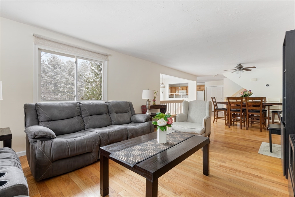 2 Arrowhead Circle, Unit 2 Ashland, MA 01721 - Photo 9 of 22 a living room with furniture and wooden floor
