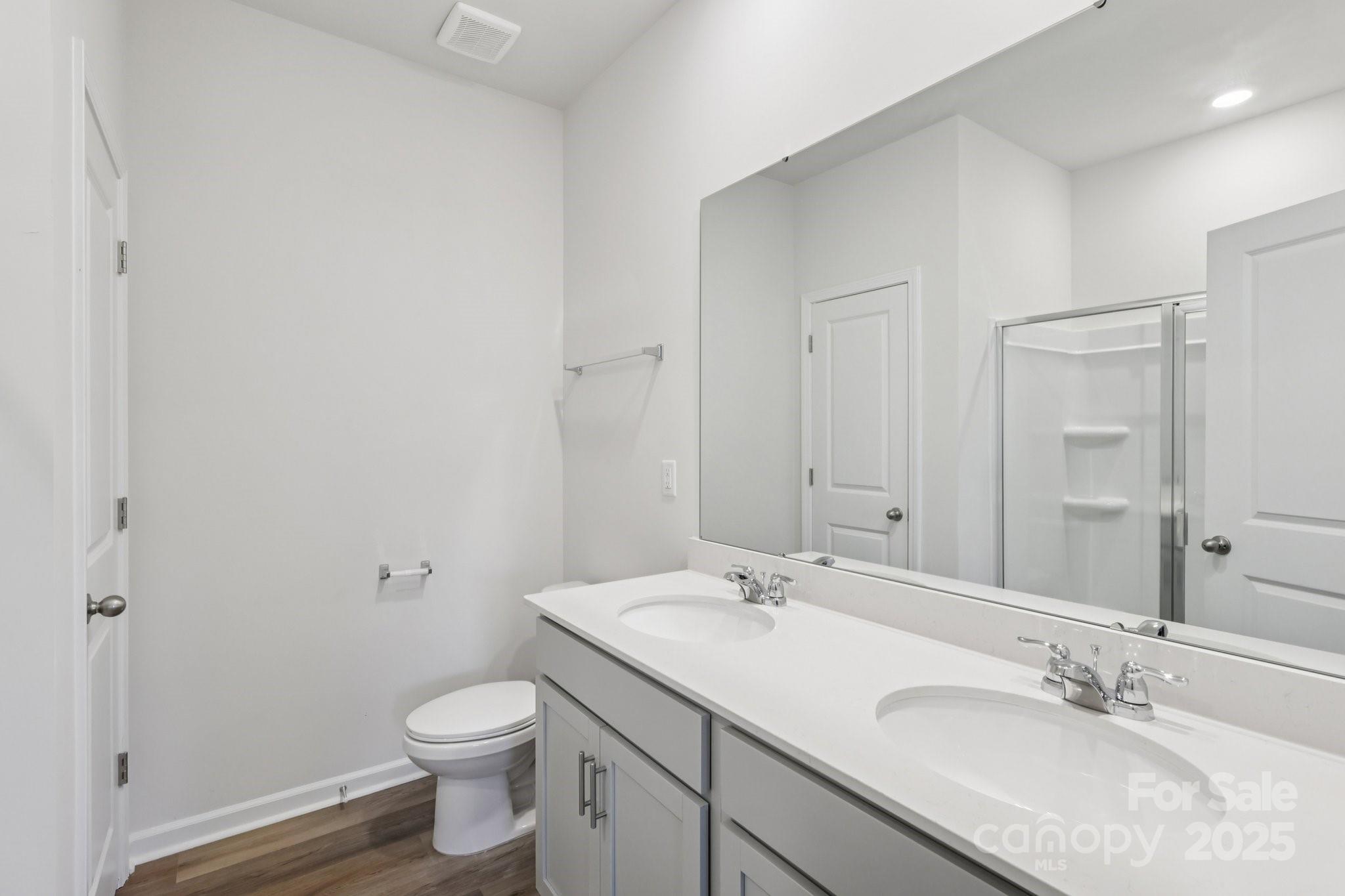 3919 Caroline Court Northwest Conover, NC 28613 - Photo 21 of 35 a bathroom with a sink toilet and vanity